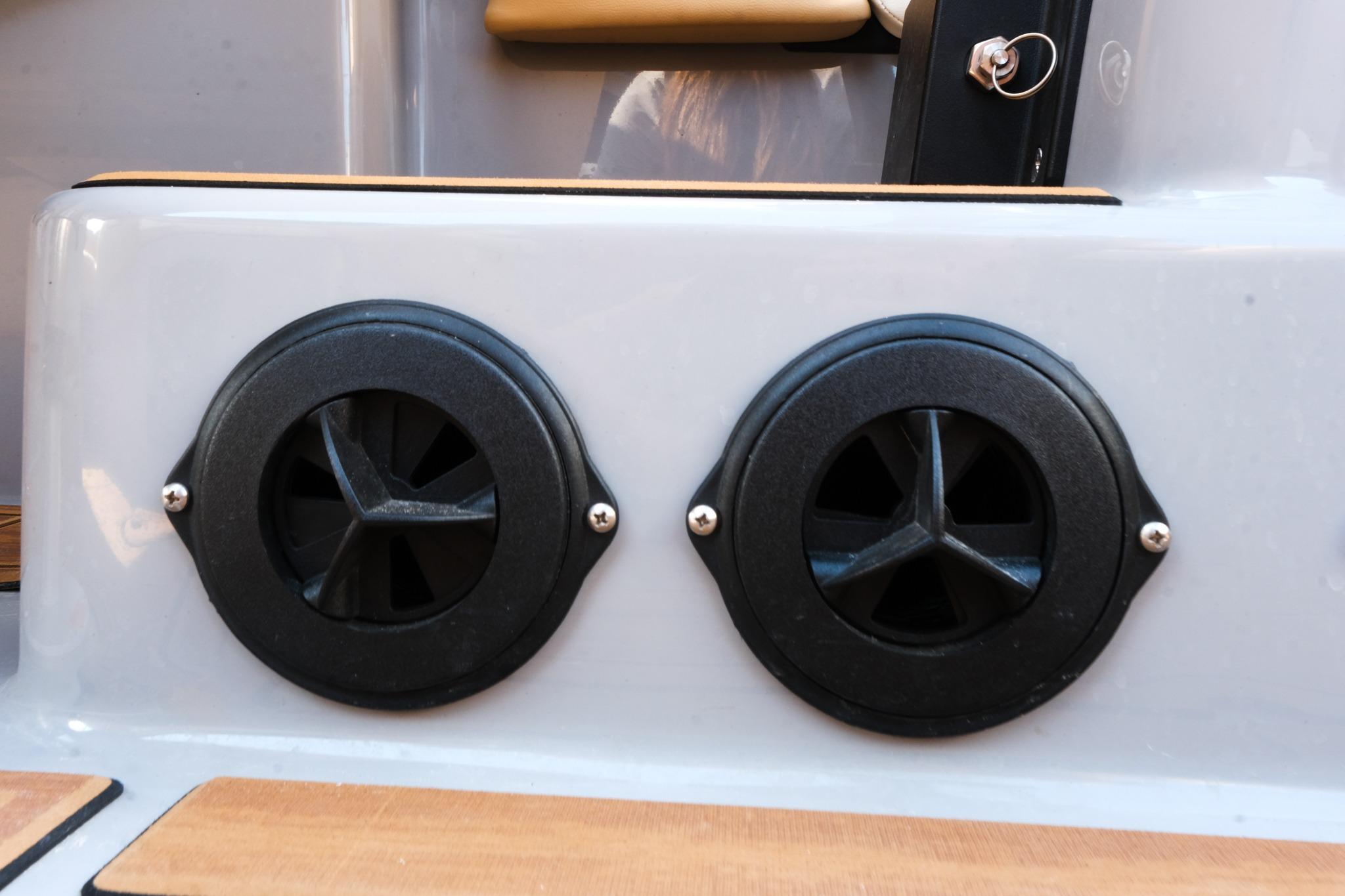 2023 Moomba Mondo boat exhaust vents with sleek black design.