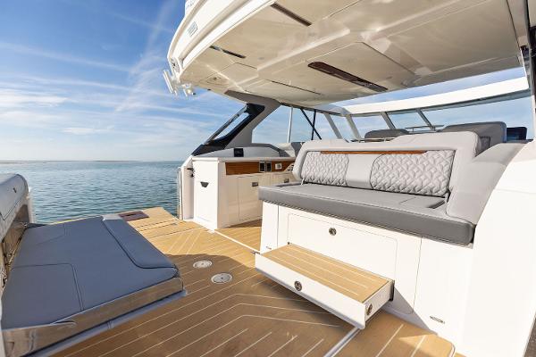 Manufacturer Provided Image: Luxurious 2026 Regal LX43 yacht interior with elegant seating and ocean view.