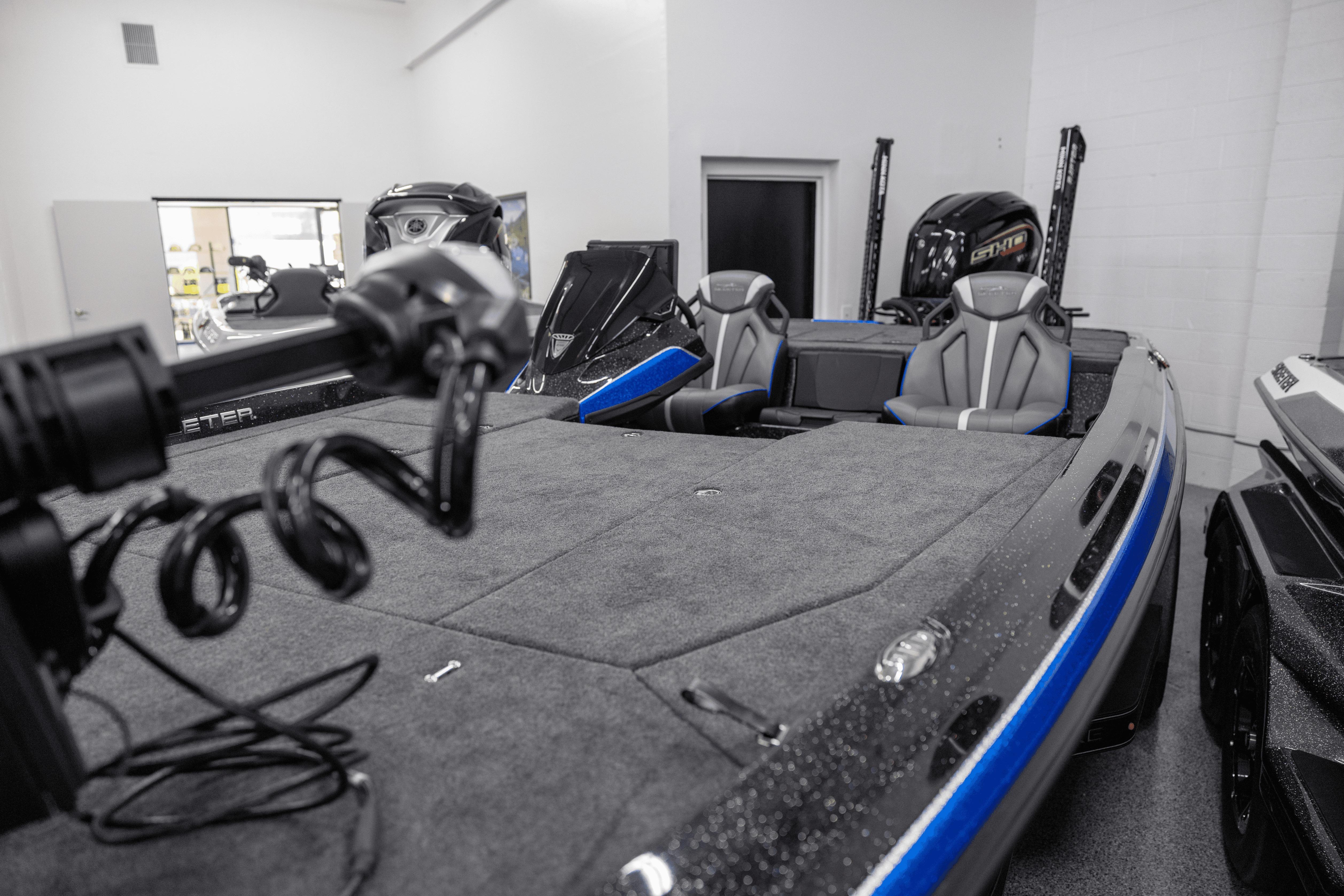 2026 Skeeter ZXE21 fishing boat interior with dual seats and advanced equipment.