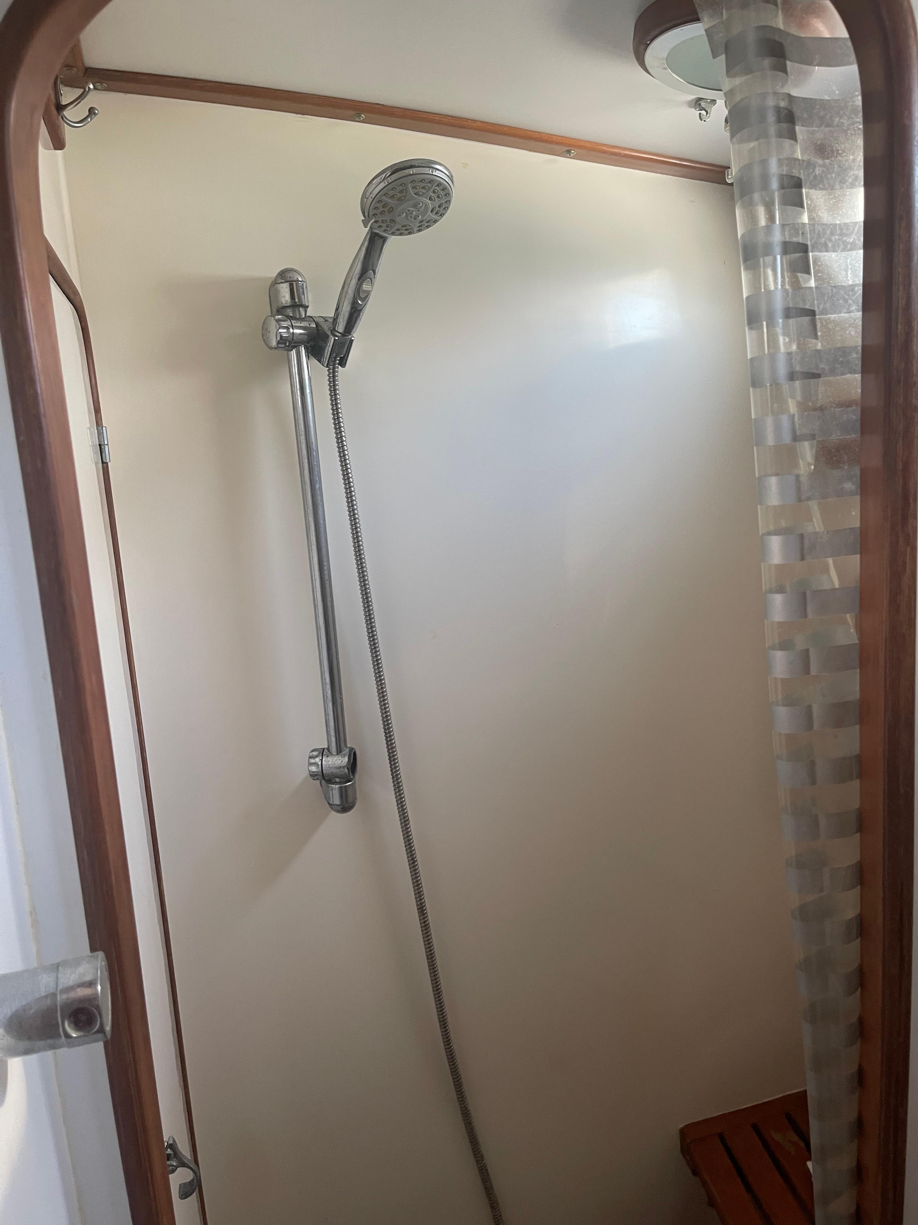 Shower area in a 1995 Passport 47 AC Plan B sailboat.