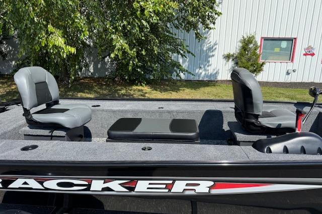 2026 Tracker Panfish 17 boat with dual seats, outdoor setting.