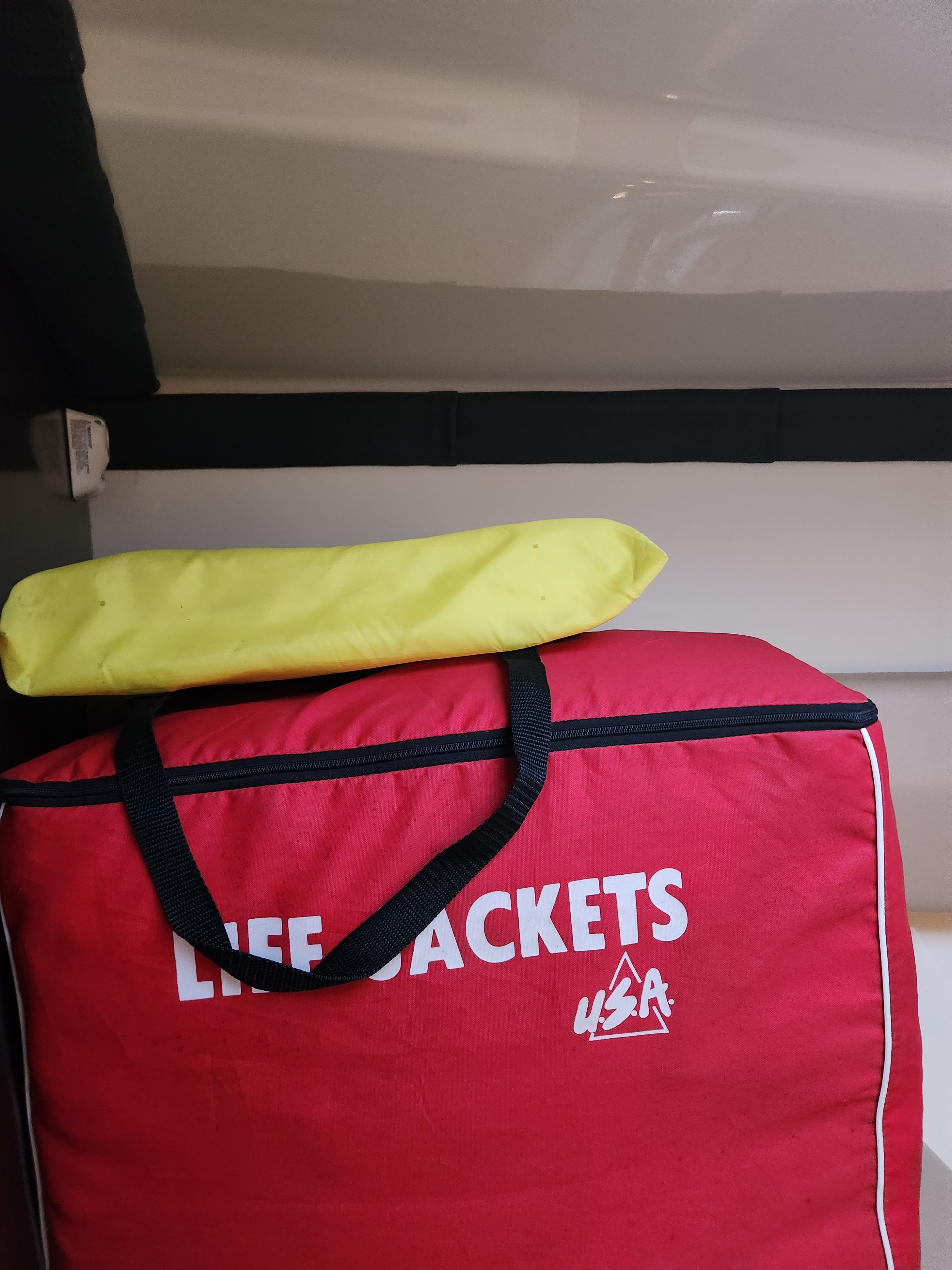 Red life jacket bag on Monterey 268SSC boat.