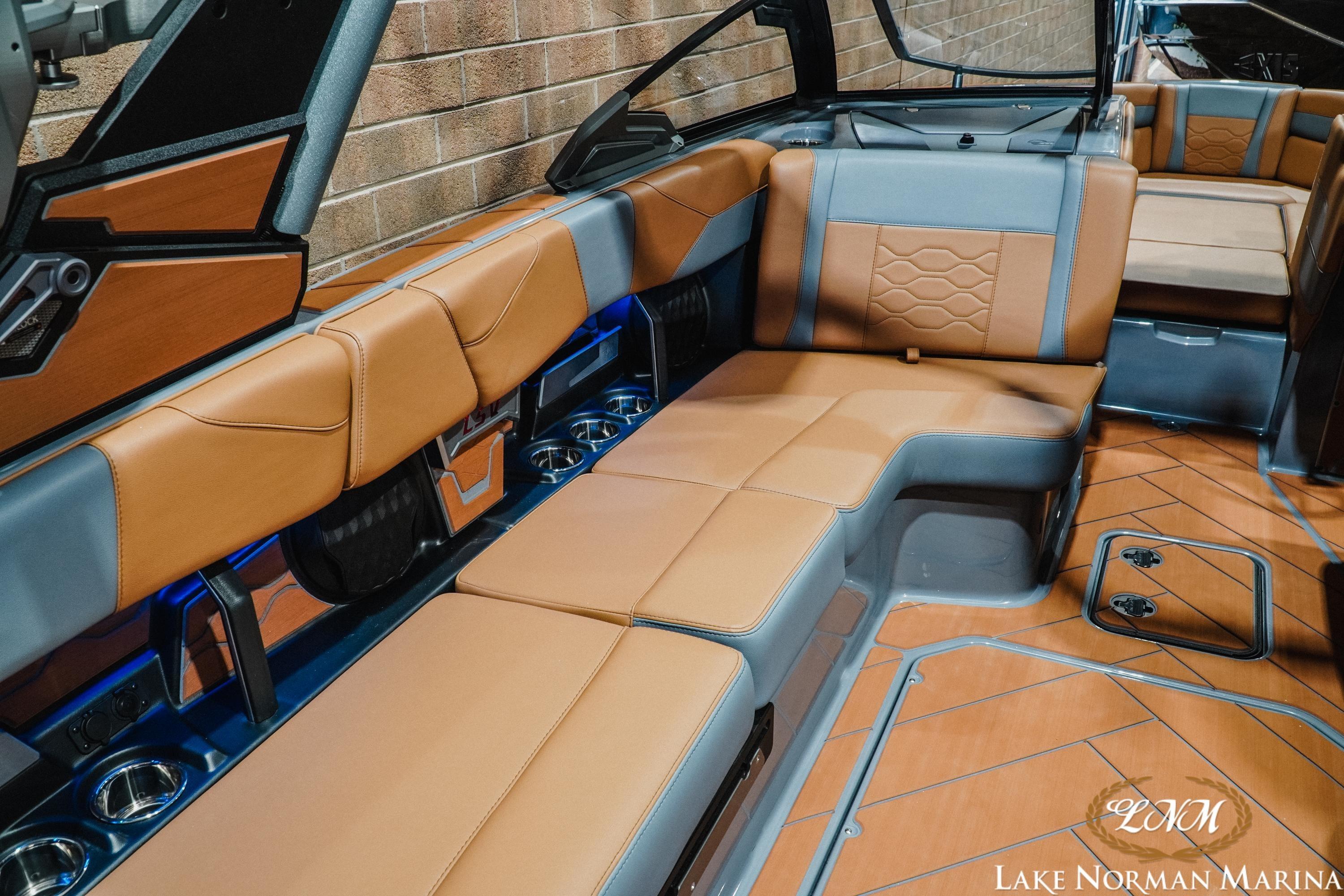 2026 Malibu Wakesetter 23 LSV interior with luxurious tan and gray seating.