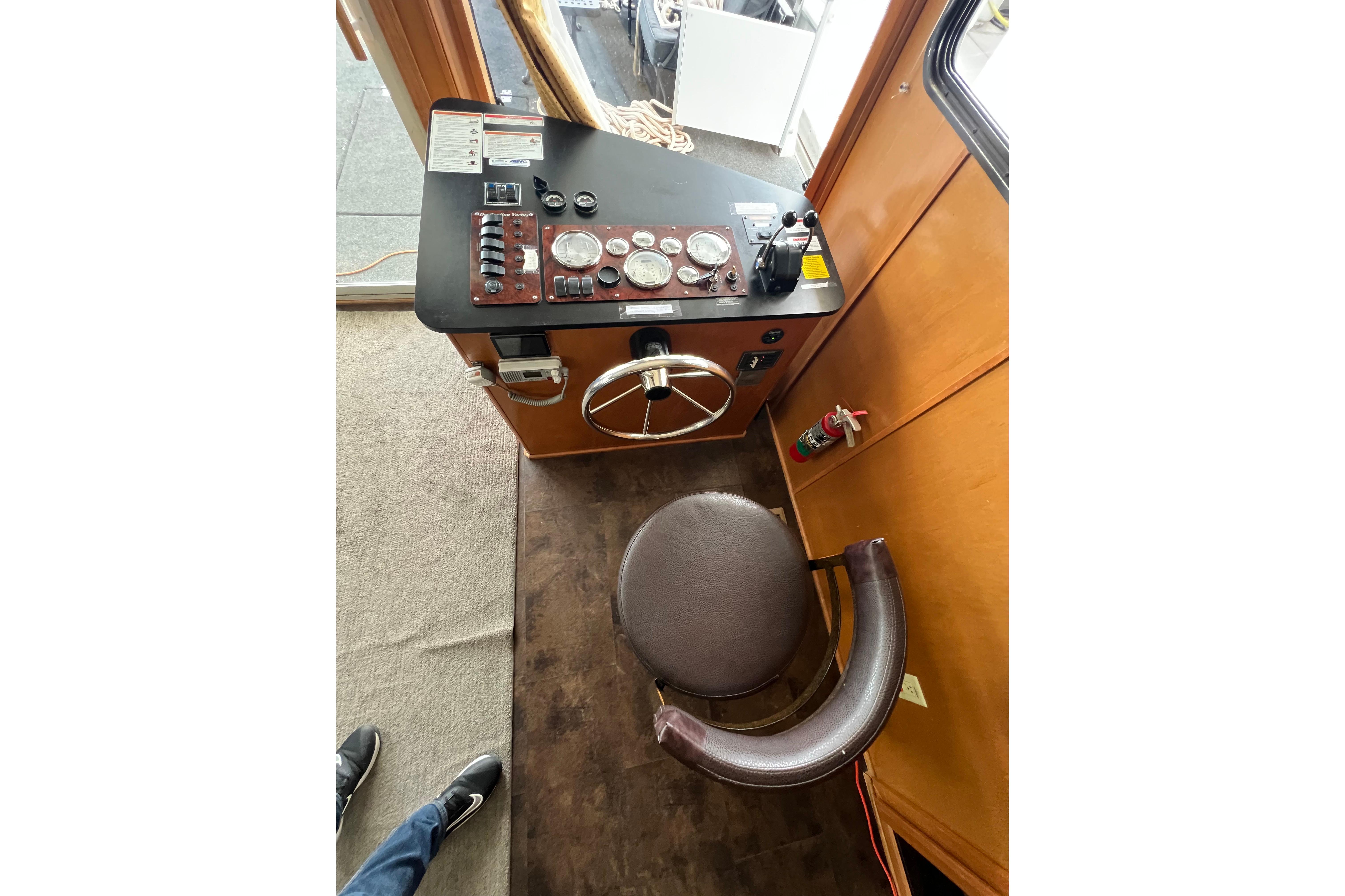 Cockpit of 2013 Destination Yacht Lotta Yachta with steering wheel and control panel.