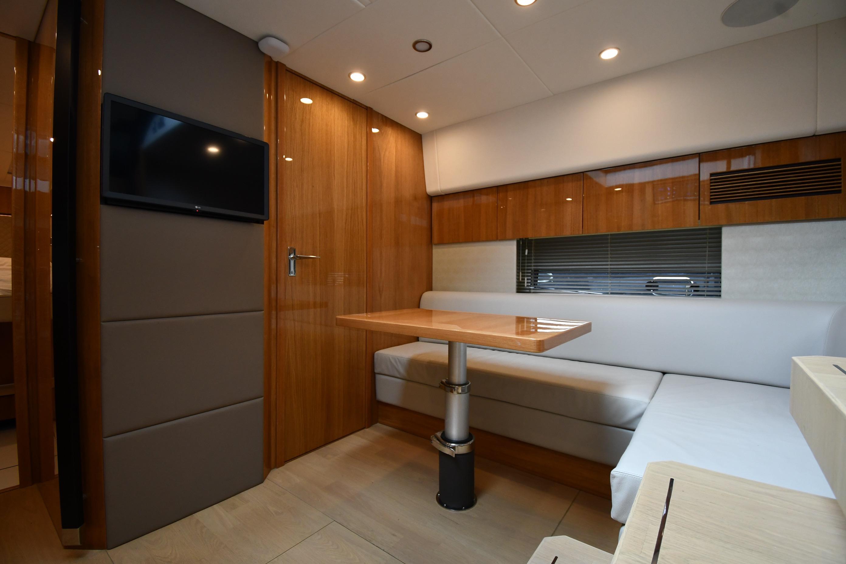 Luxurious interior of 2024 Fairline G50 Targa yacht with modern seating and sleek design.