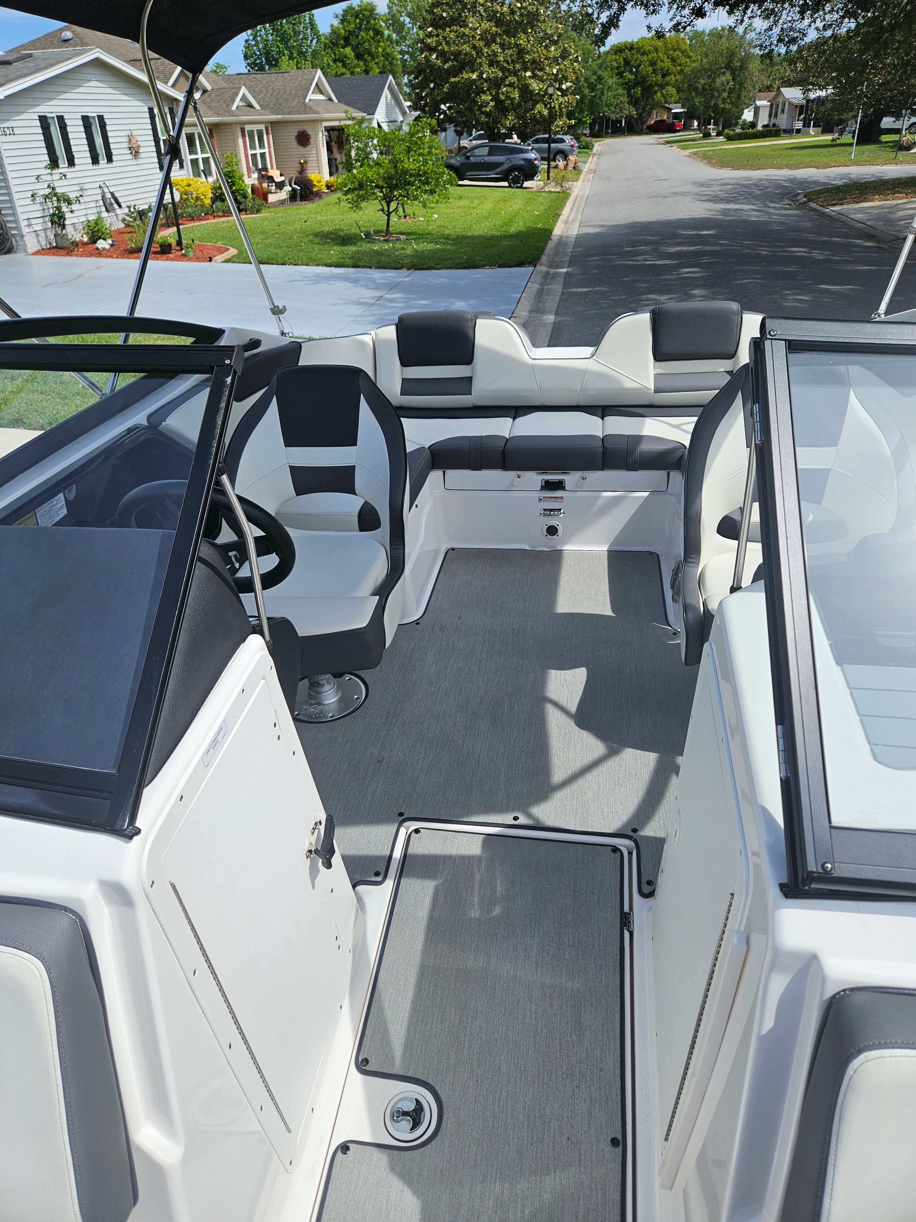 Interior of a 2022 Yamaha SX210 boat with modern seating.