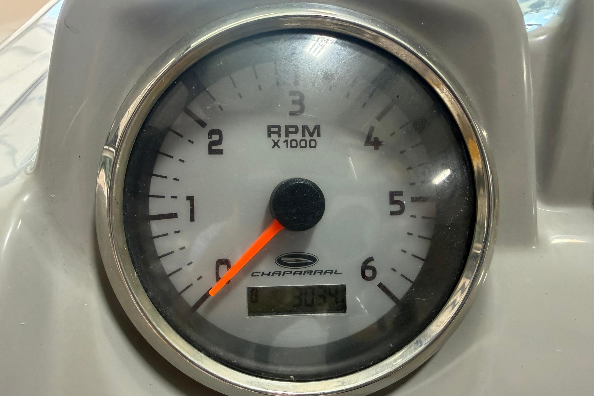 Tachometer of 2012 Chaparral 19 Sport H2O showing RPM with orange needle.