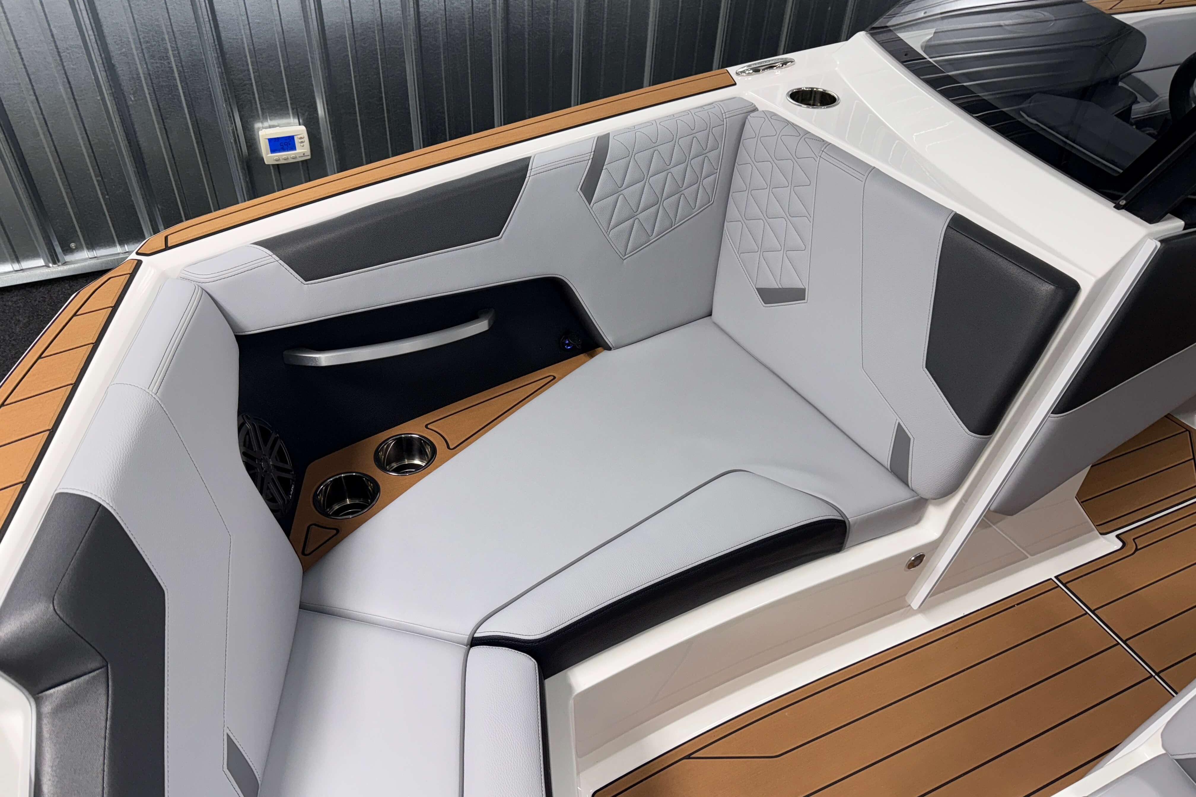 2026 Nautique Super Air Nautique GS22 interior with luxurious seating and modern design.