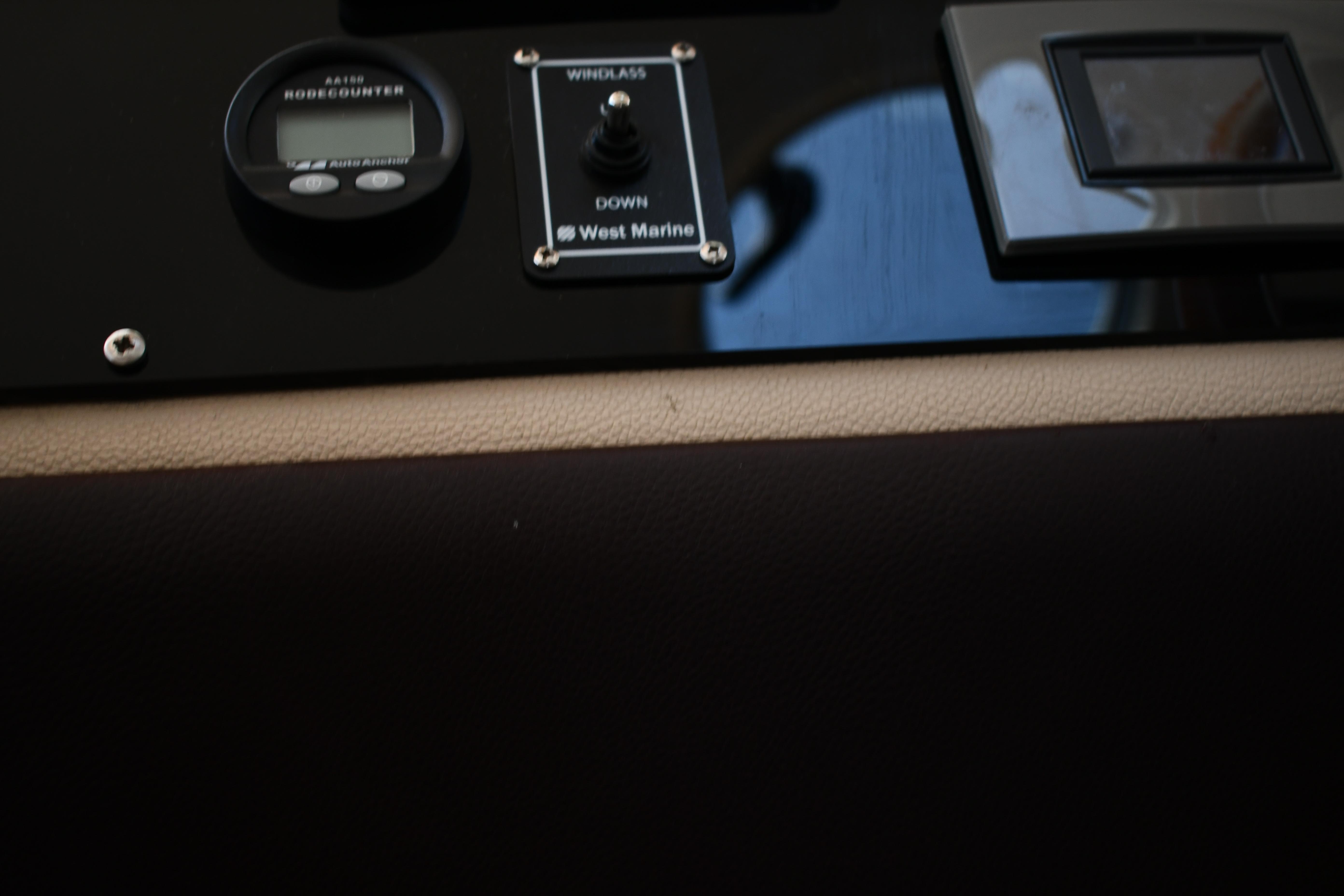 Control panel of a 2012 Fountaine Pajot 40 catamaran with windlass and rode counter.