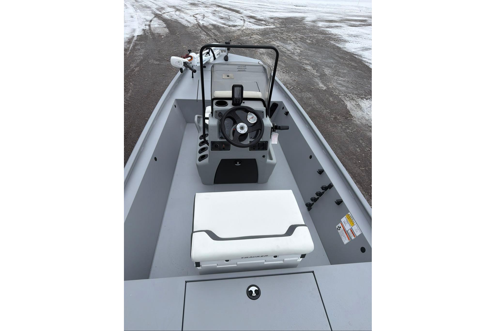2026 Tracker Bass Tracker Classic CC boat interior with steering console and seating.