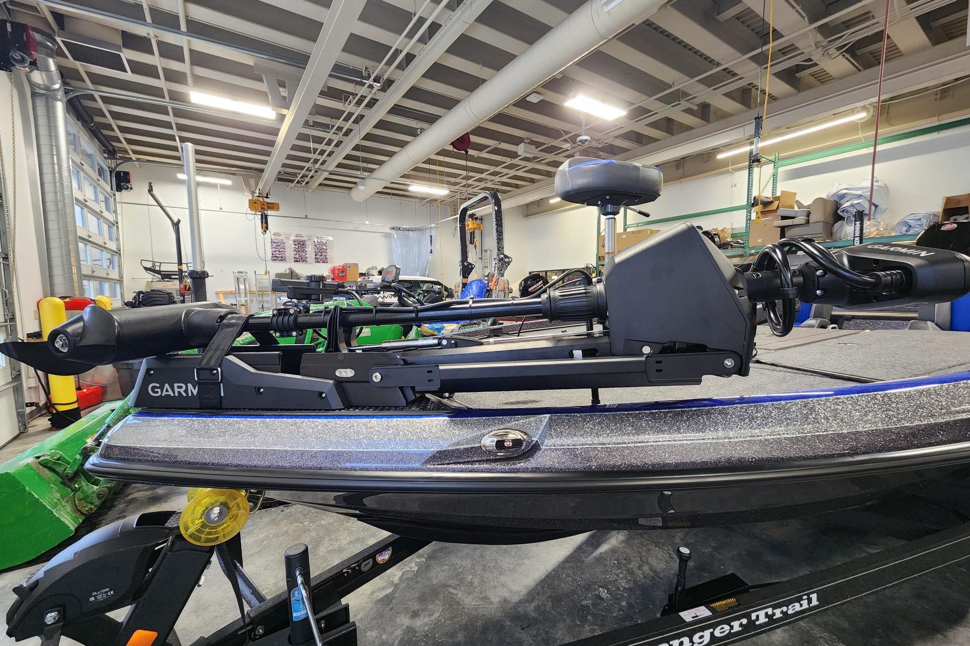 2025 Ranger Z521R boat in a workshop, featuring advanced equipment and sleek design.