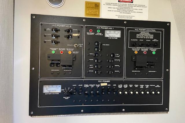 Electrical control panel on a 1994 Cruisers Yachts 3675 Esprit boat.