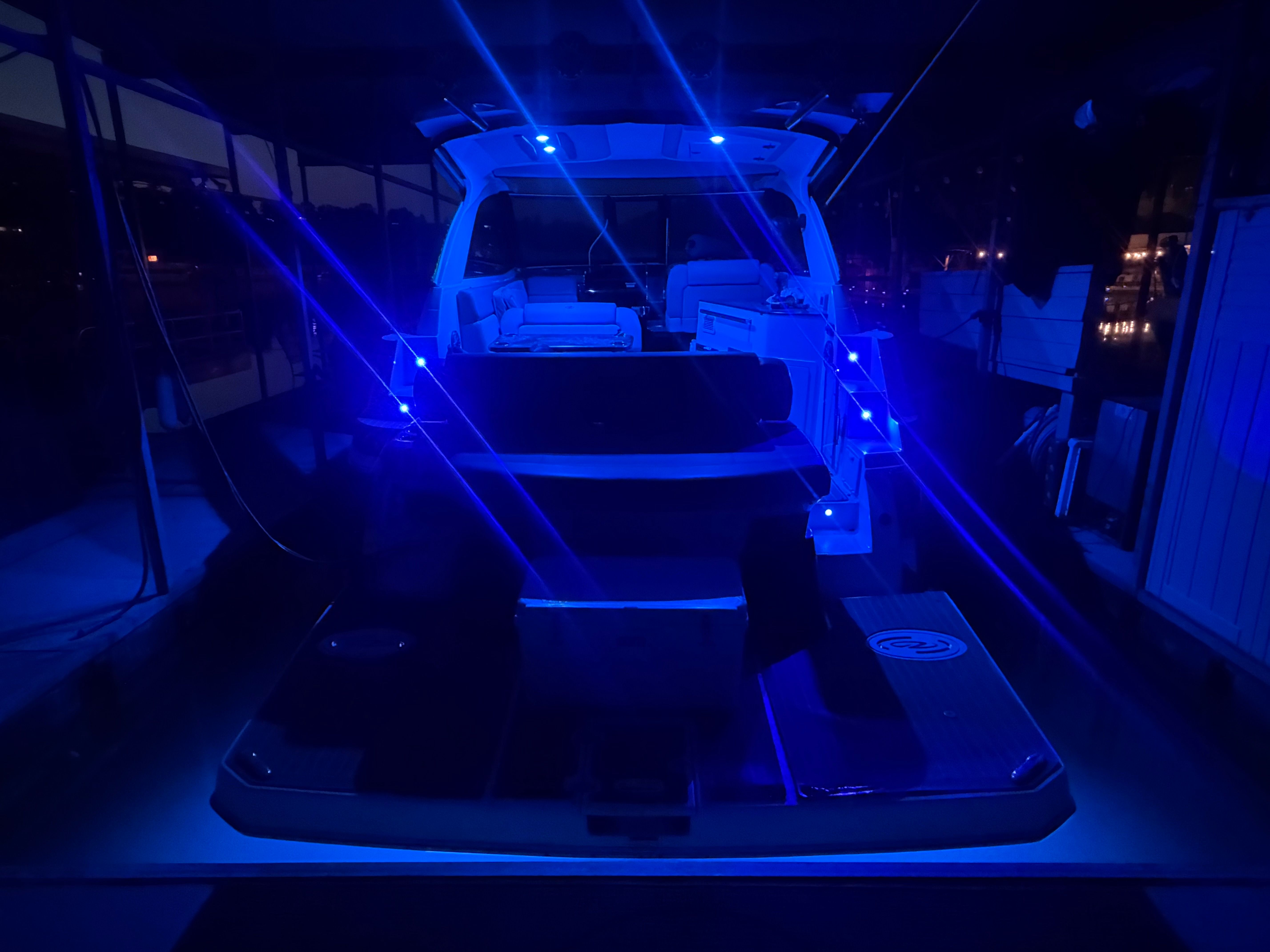2015 Regal 35 Sport Coupe with blue LED lighting in the dark.