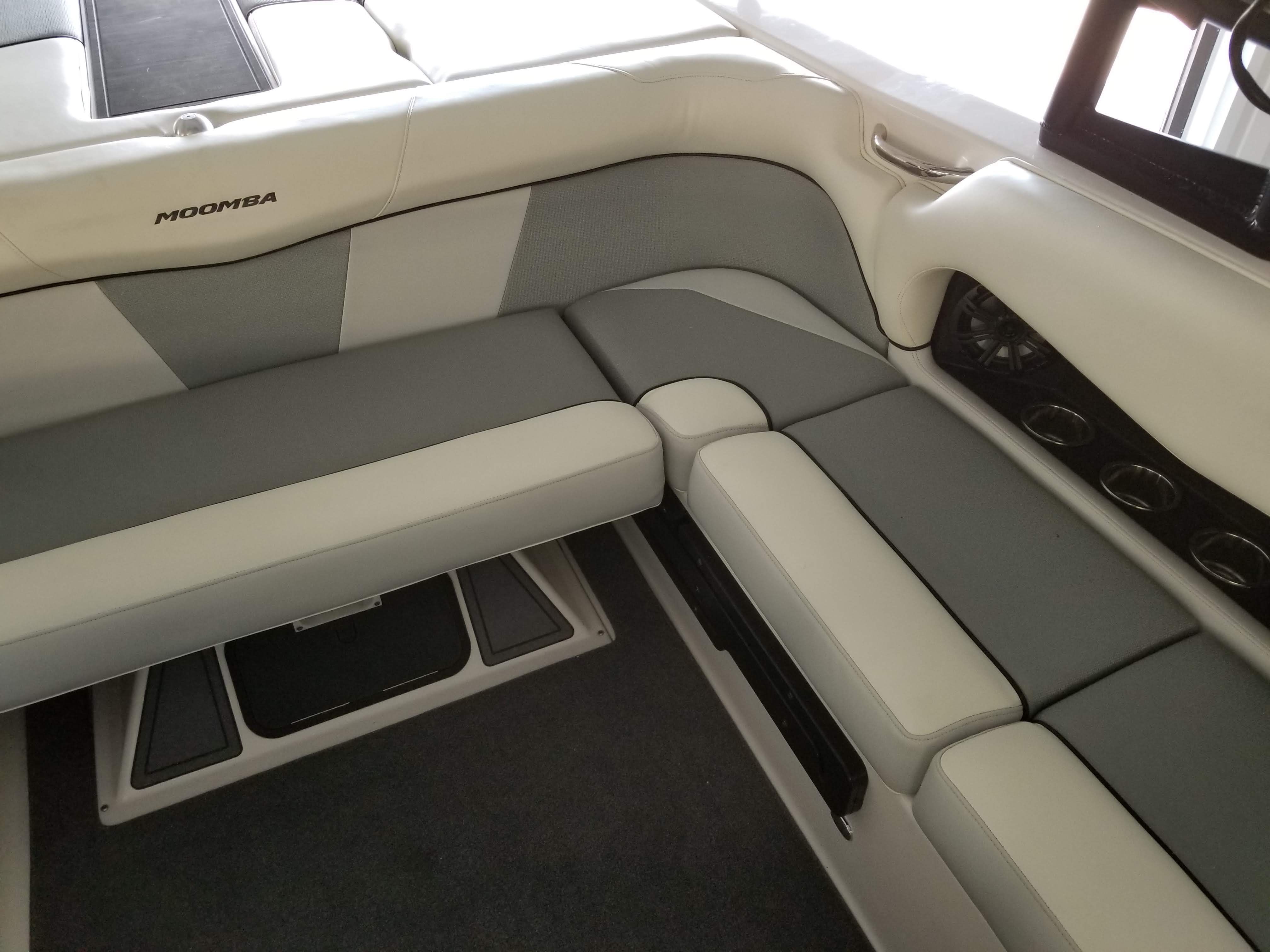 Interior of a 2016 Moomba Mondo with gray and white upholstery.