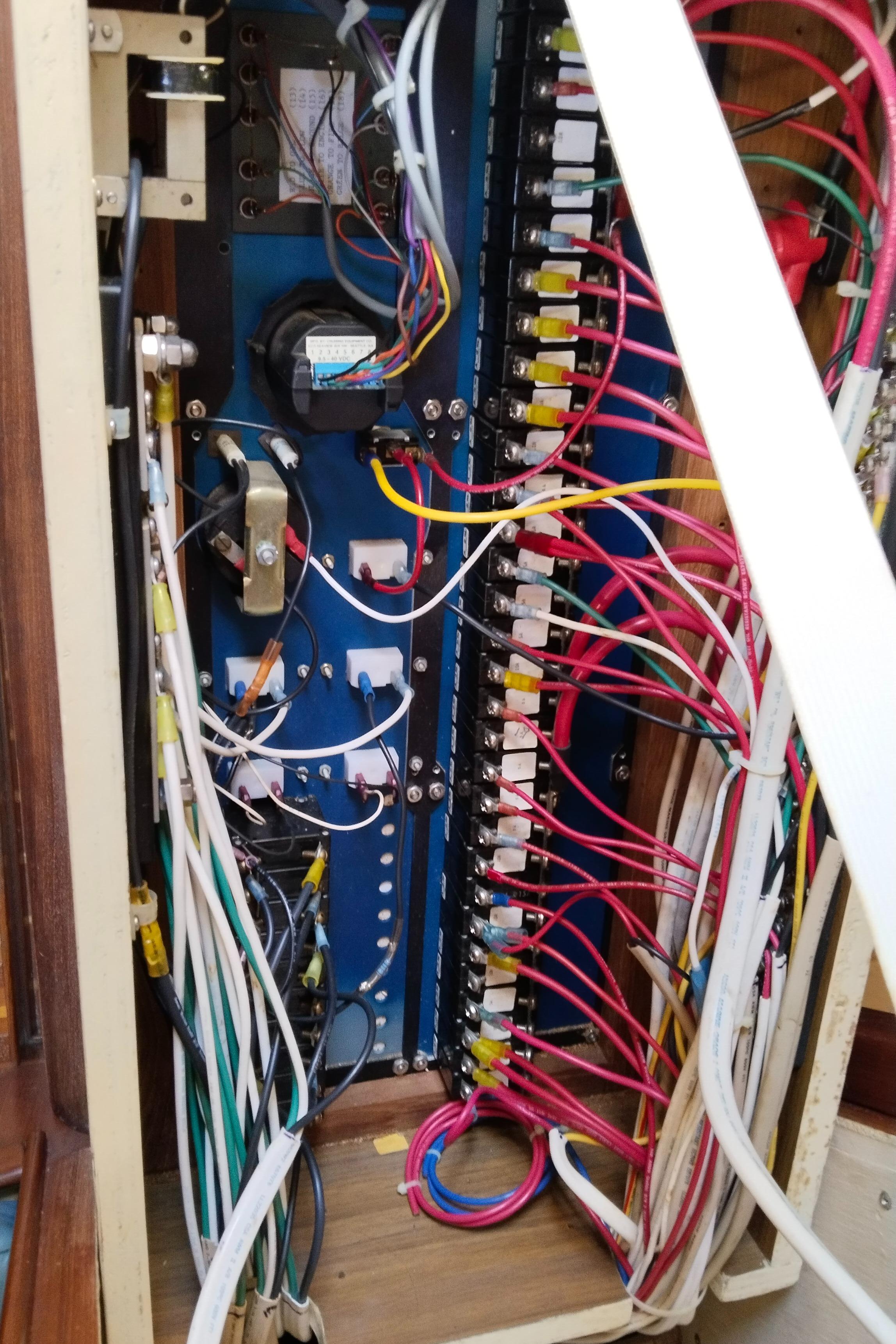 Electrical panel with colorful wiring in a 1979 Morgan 461 boat.