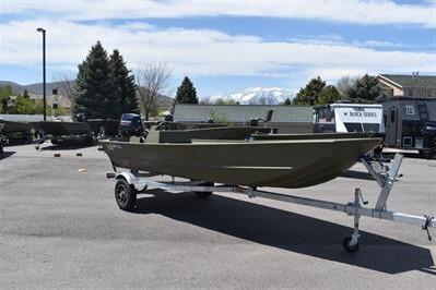 2025 Lowe L1648M Jon boat on trailer in outdoor parking lot.
