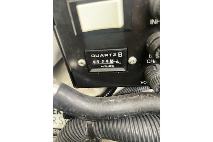 Hour meter reading 705 on a 2005 Sea Ray Sundancer 320 boat.