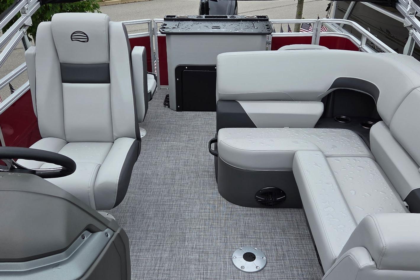 2026 Sun Tracker SportFish 20 DLX interior with gray seating and modern design.
