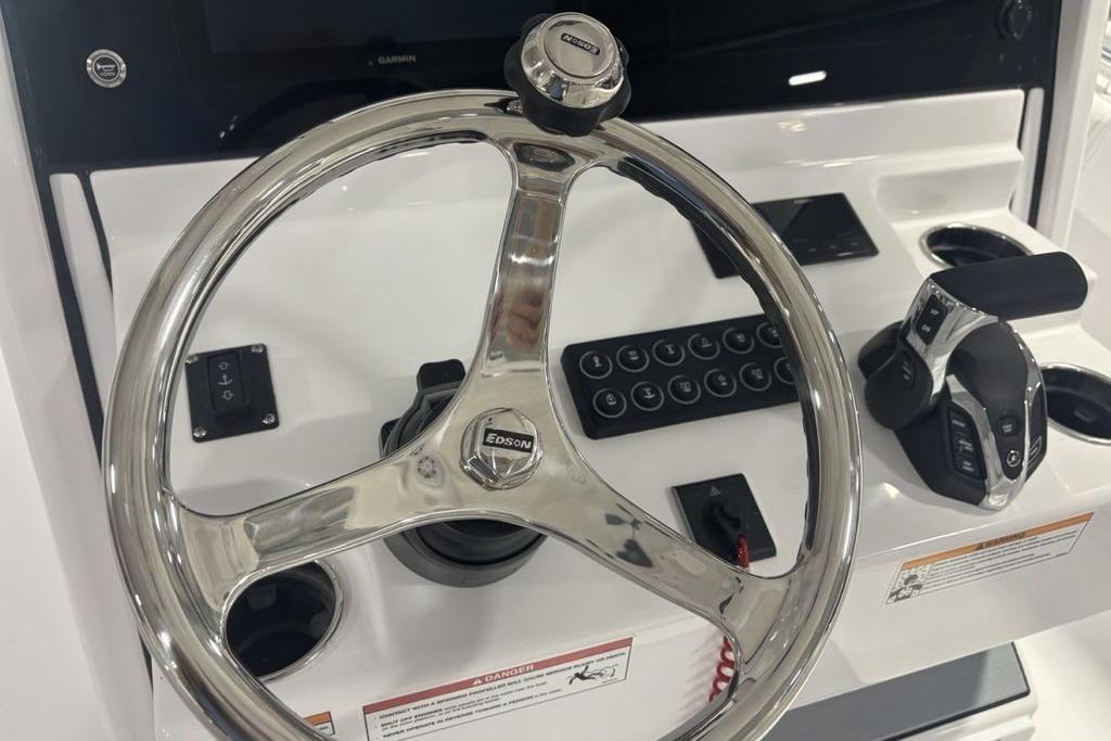 Steering console of 2026 Sportsman Open 252 Center Console boat with modern controls.