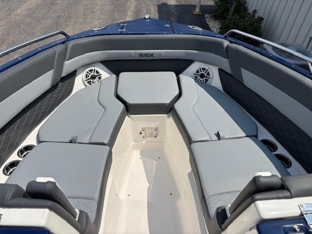 2026 Chaparral SSX 6 boat interior with gray seating and cup holders.