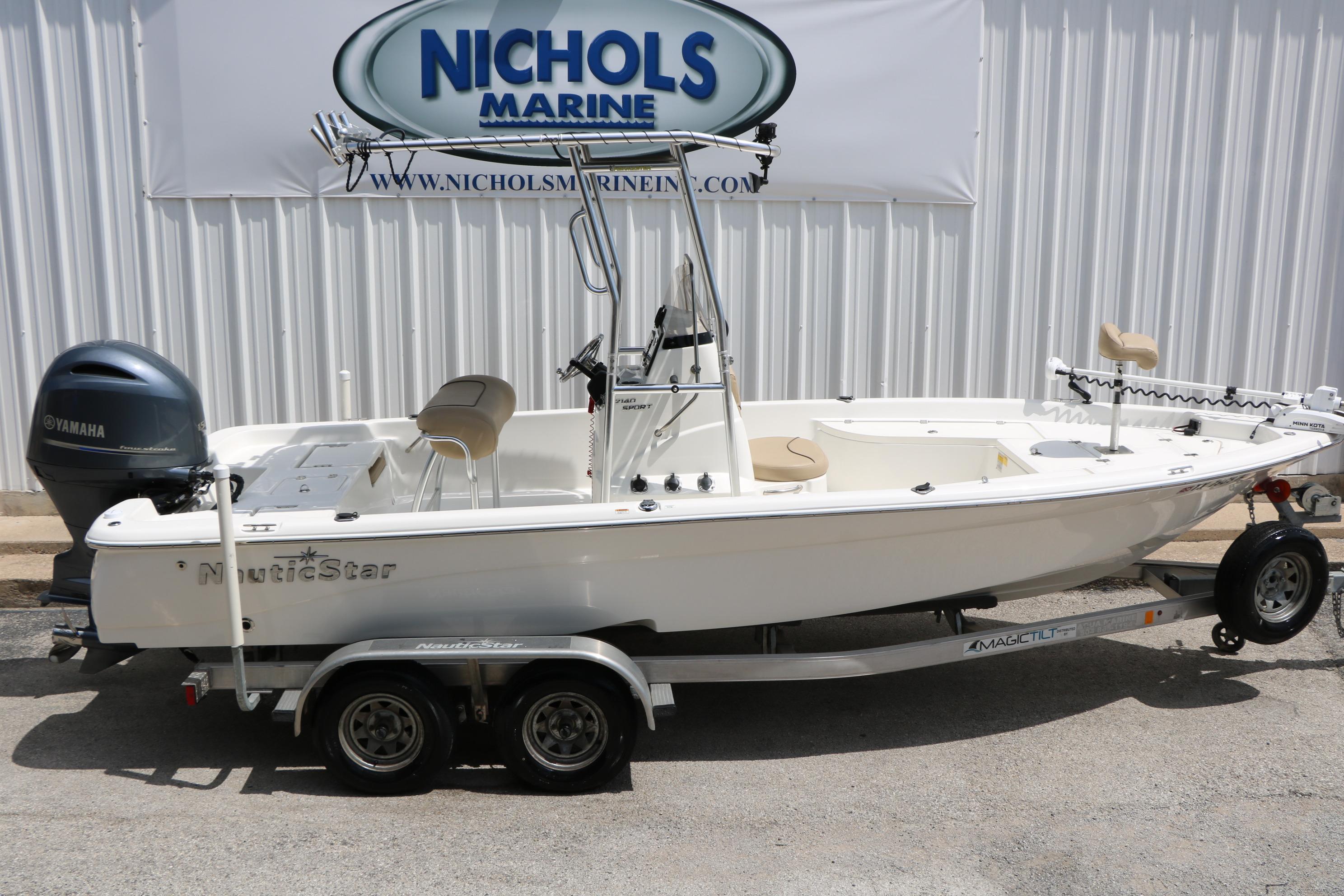 2020 NauticStar 2140 Sport boat on trailer at Nichols Marine dealership.