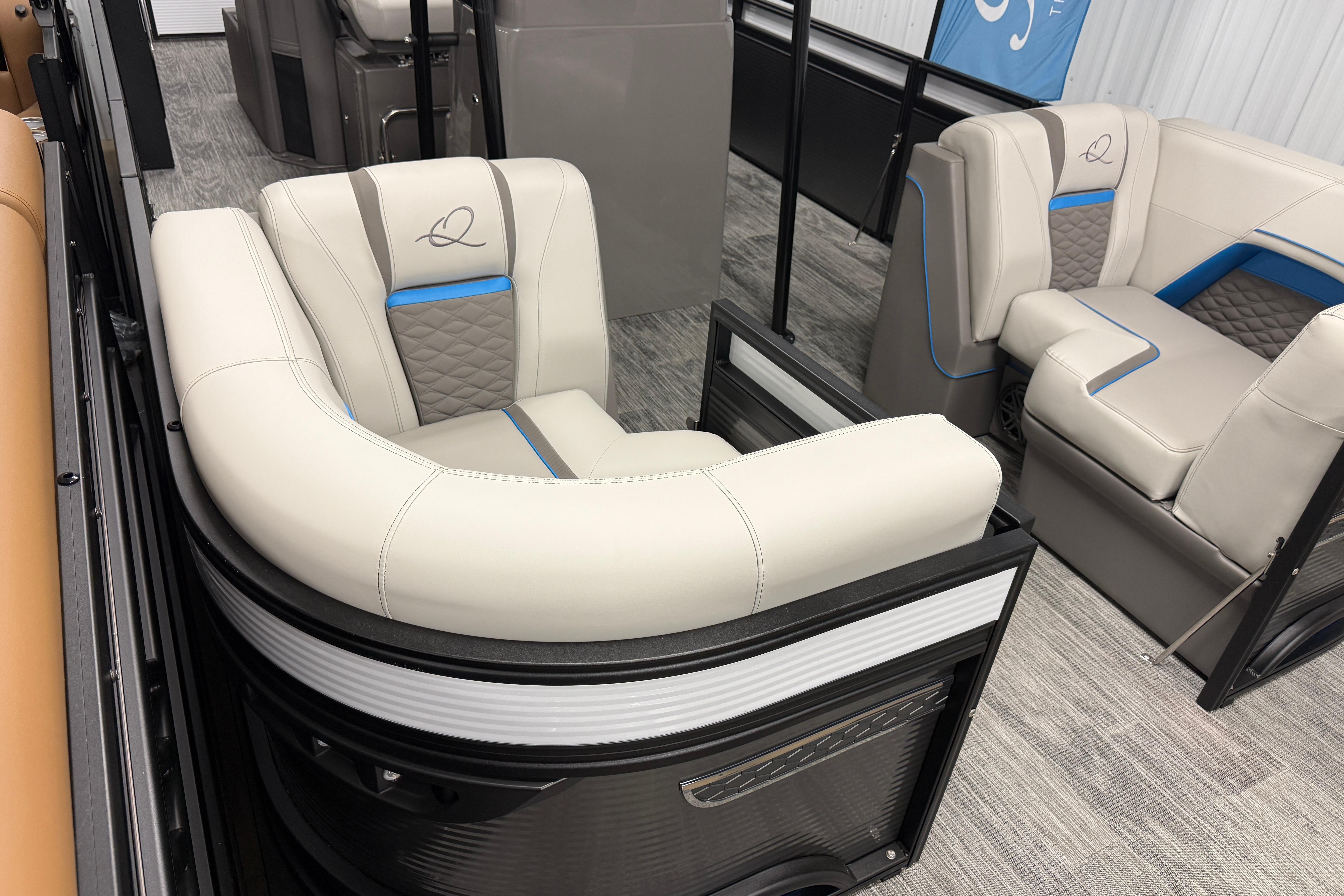 Luxurious seating in 2026 Qwest M-Class 22 Pro Sport boat, featuring modern design and comfort.