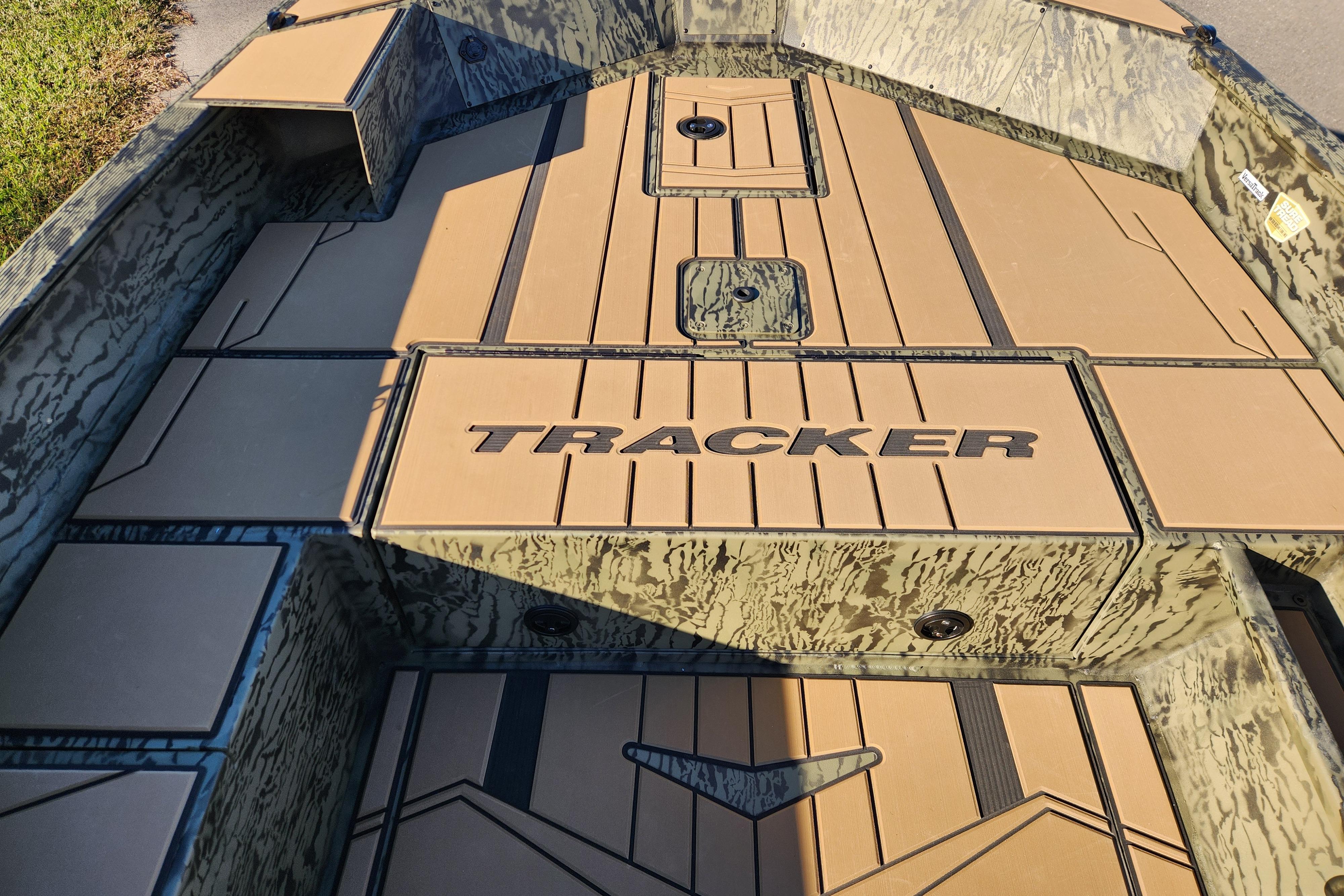 2026 Tracker Grizzly 1756 T Marsh boat interior with camo design and logo.