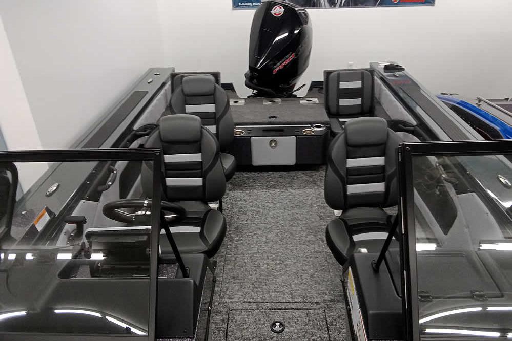 2026 Ranger VX1888 WT boat interior with seating and motor, showcasing modern design.