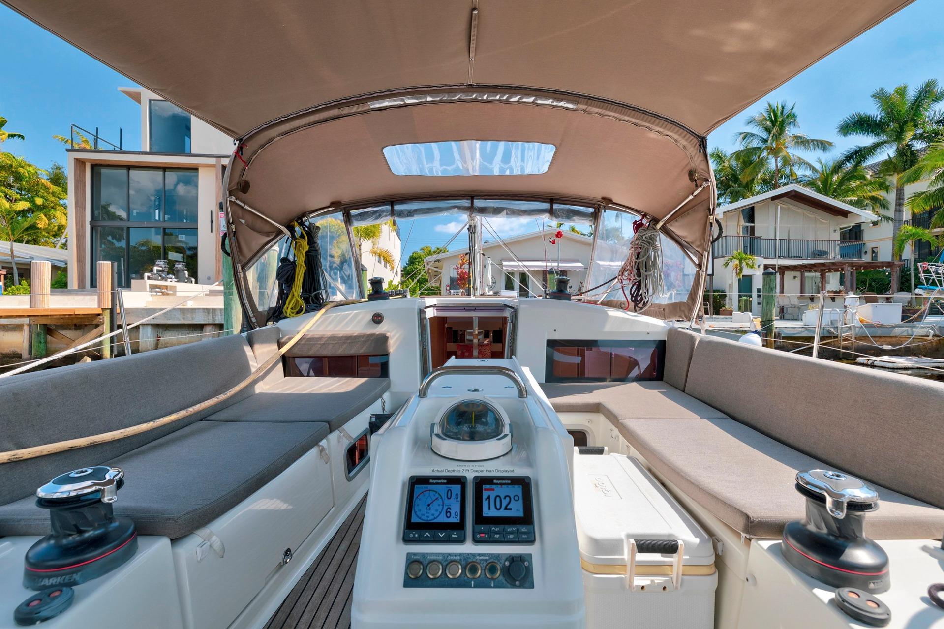 2021 Jeanneau Sun Odyssey 440 yacht interior with modern cockpit and navigation equipment.