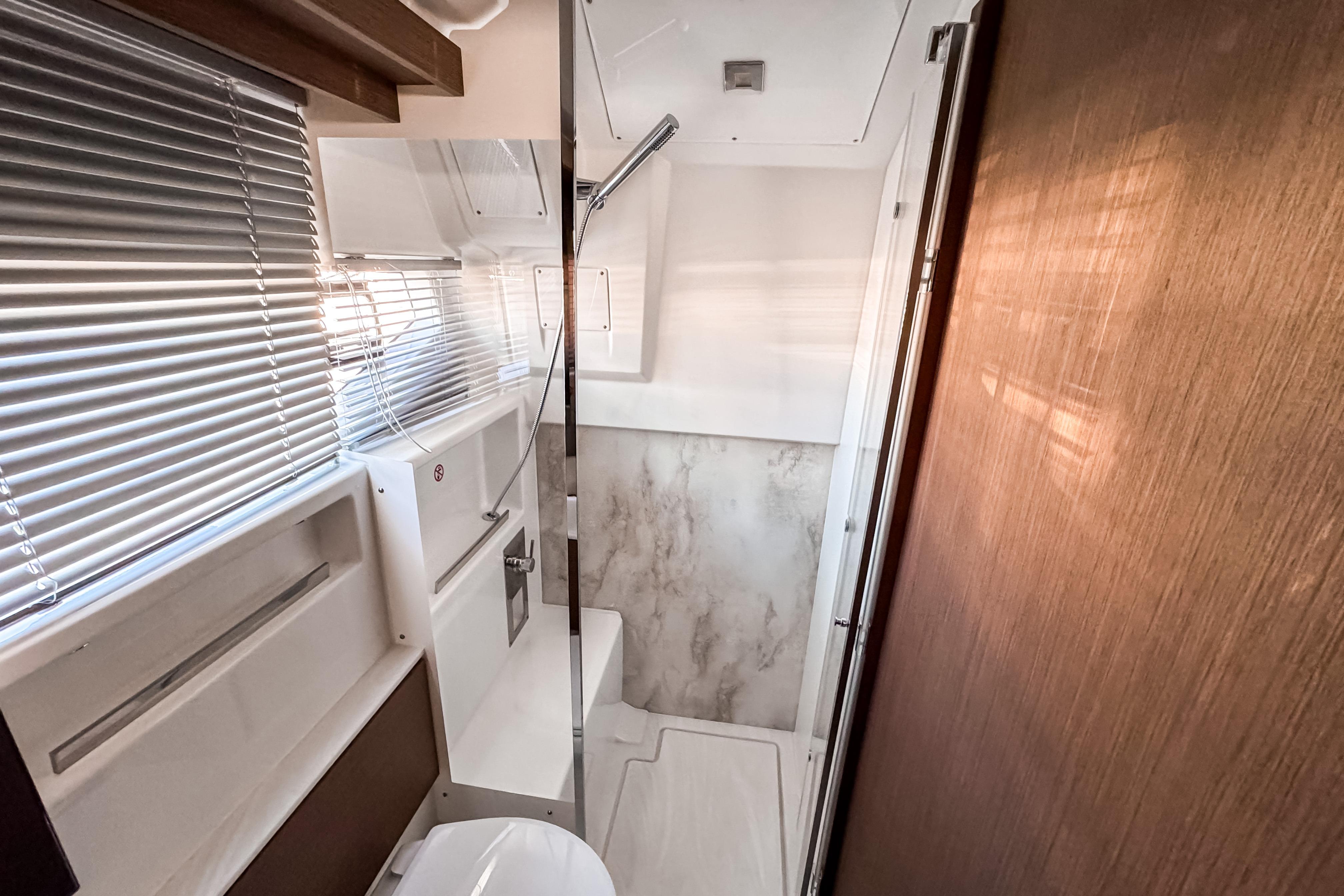 Interior view of Wellcraft 44 Explorer 2026 bathroom.