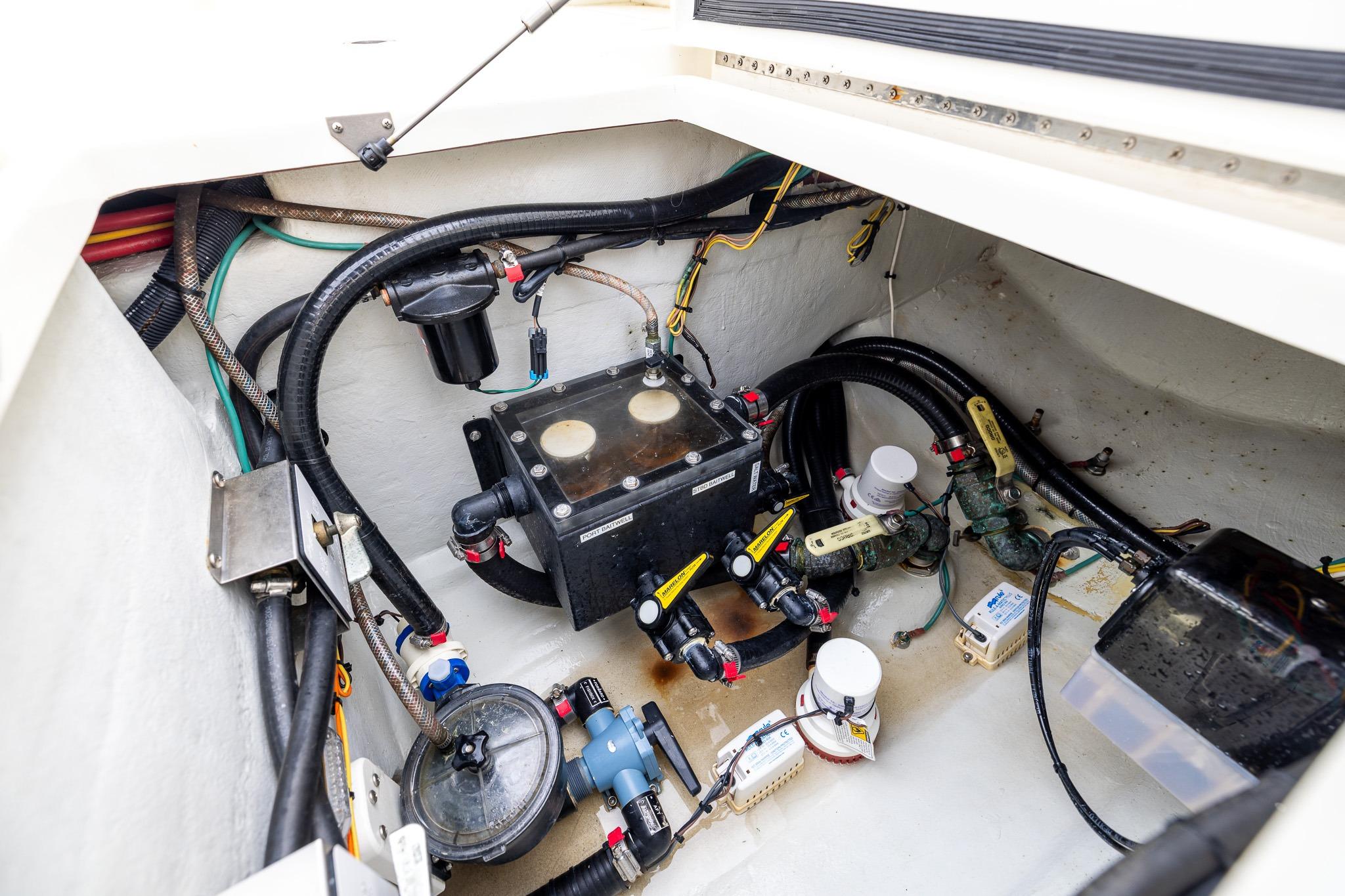 2019 SeaVee 322Z boat interior showing complex wiring and plumbing system.