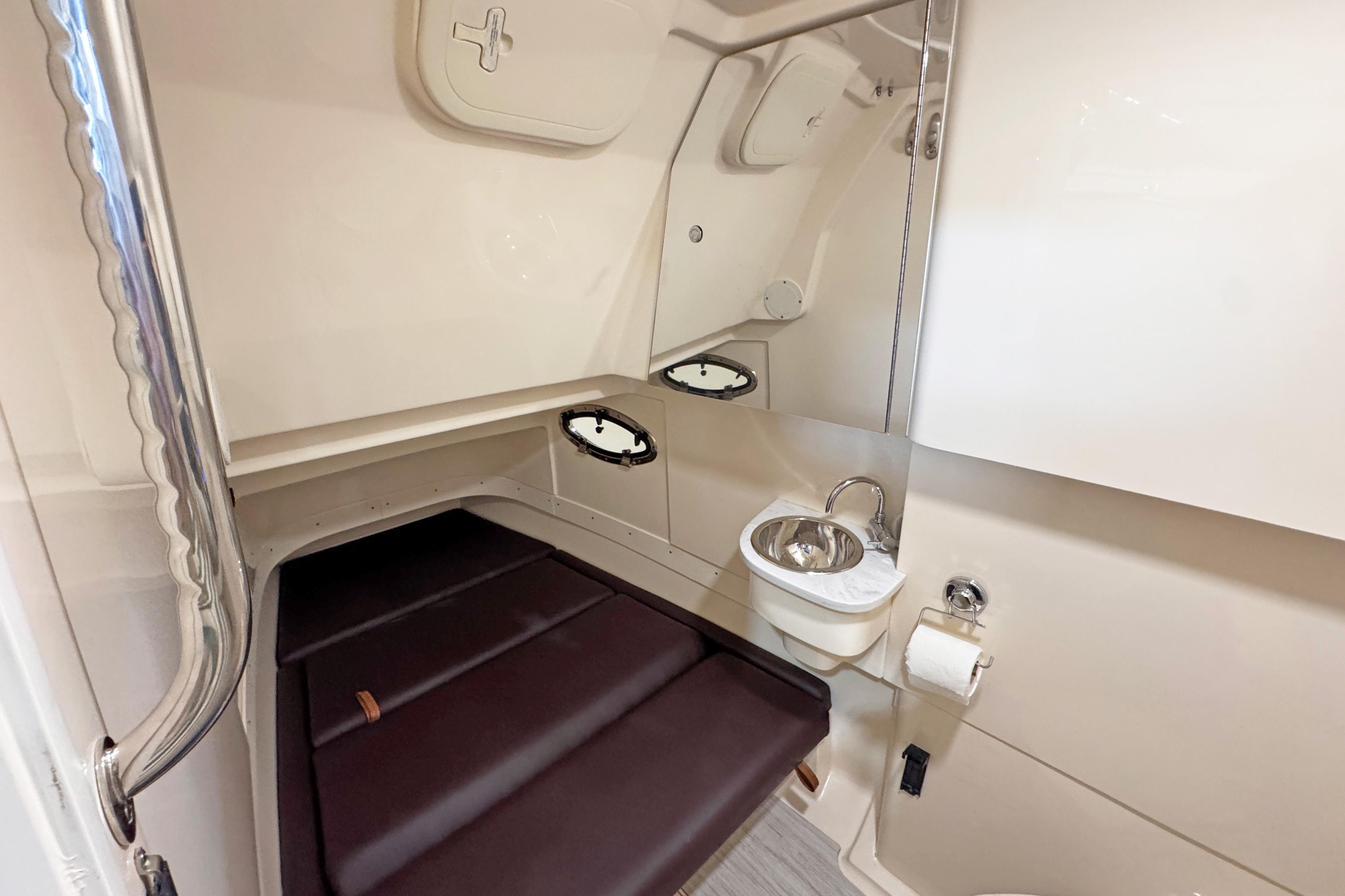 Interior of 2021 Scout 305 LXF with toilet and sink.