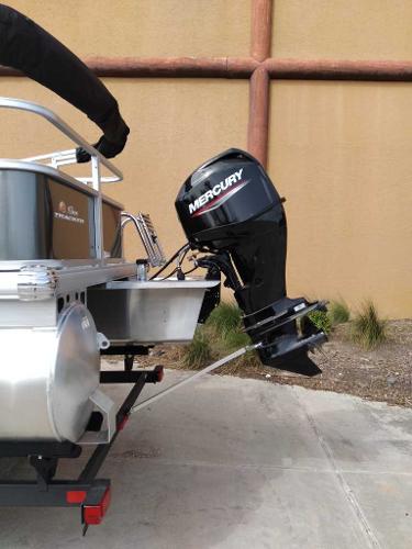 2025 Sun Tracker Party Barge 18 DLX with Mercury outboard motor.