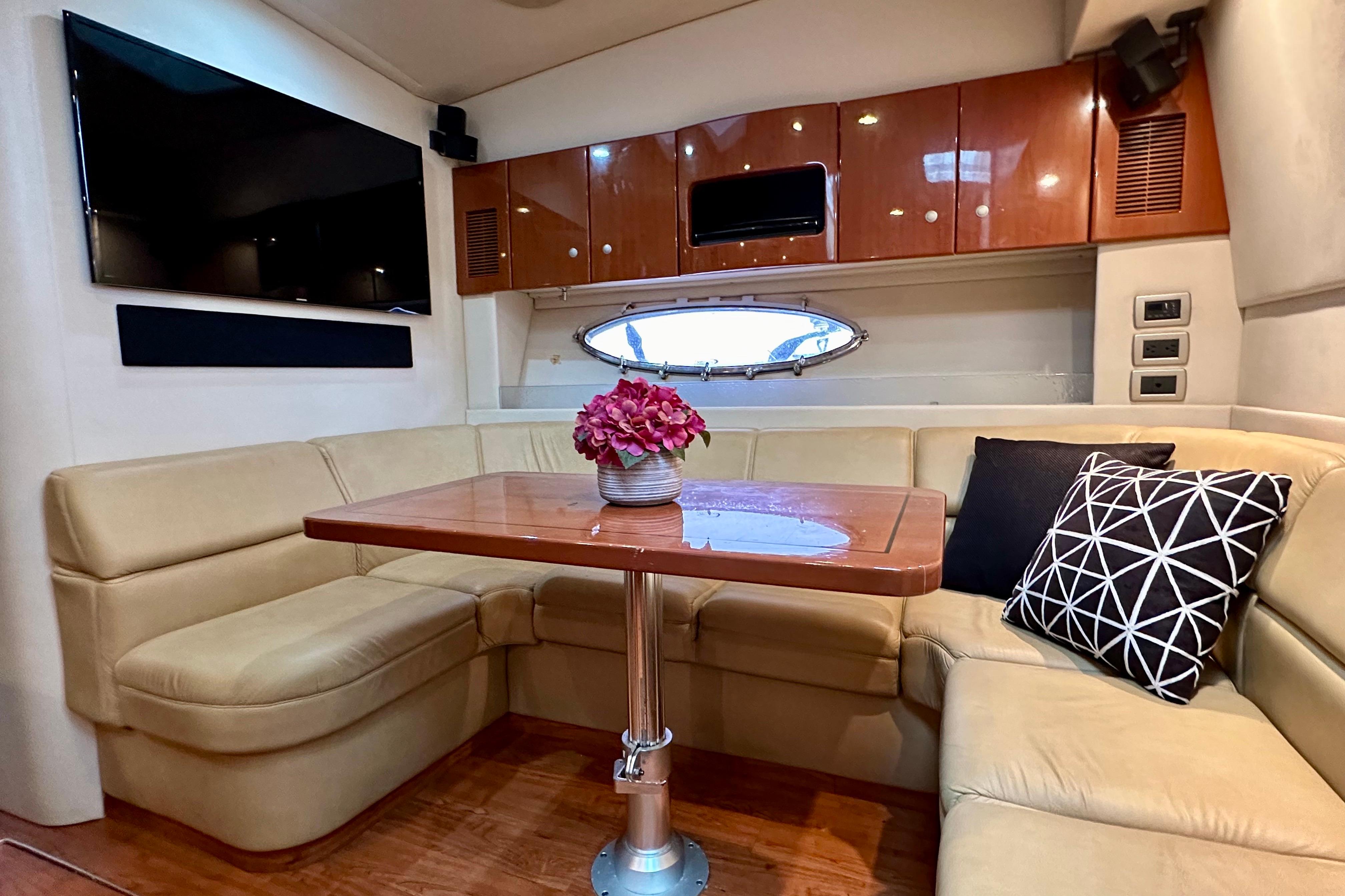 Luxurious interior of a 2008 Formula 45 Yacht with plush seating and elegant decor.
