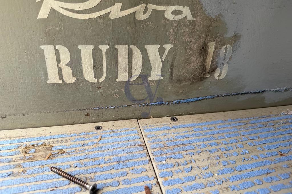 1972 Riva Rudy boat interior with logo and textured flooring.
