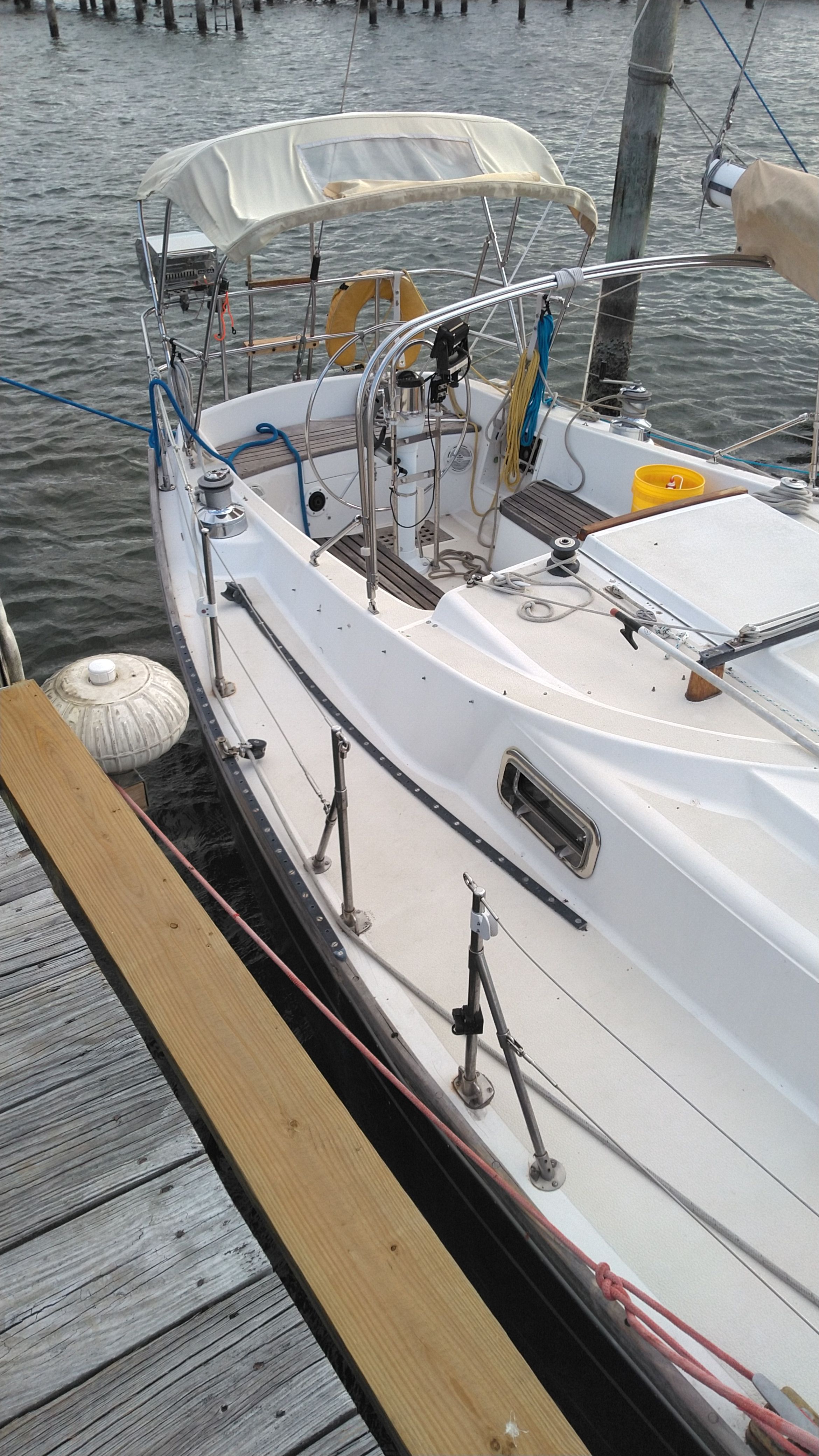 1978 Tartan 37 sailboat docked at marina.