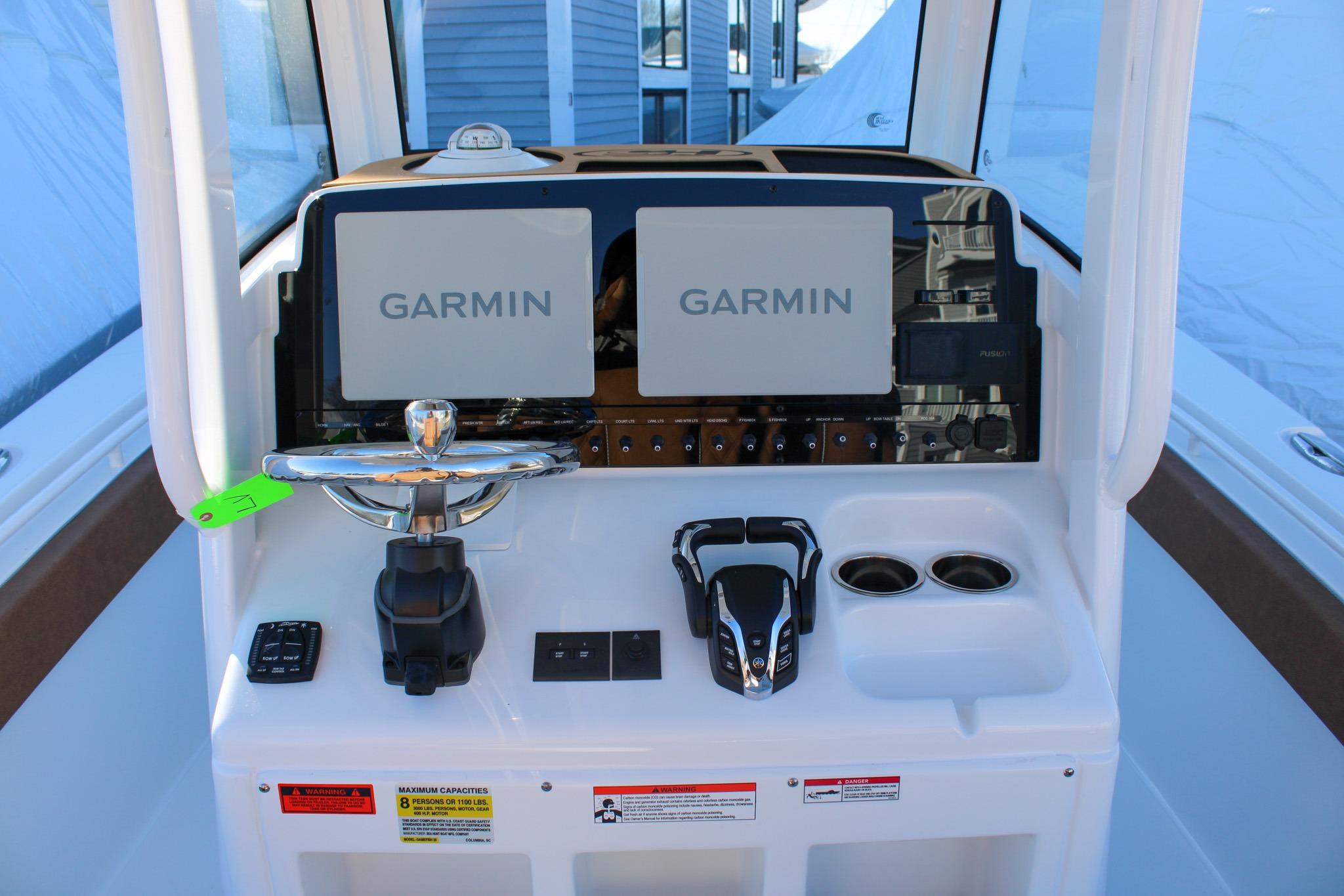 2026 Sea Hunt Gamefish 25 dashboard with dual Garmin displays and modern controls.