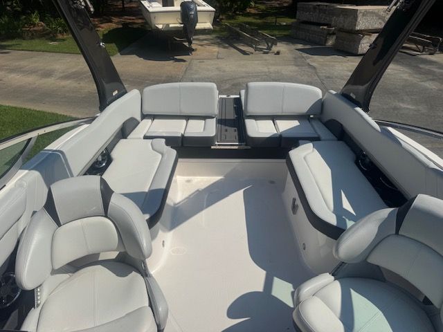 Interior view of a 2015 Regal 2500 Bowrider boat with gray seating.