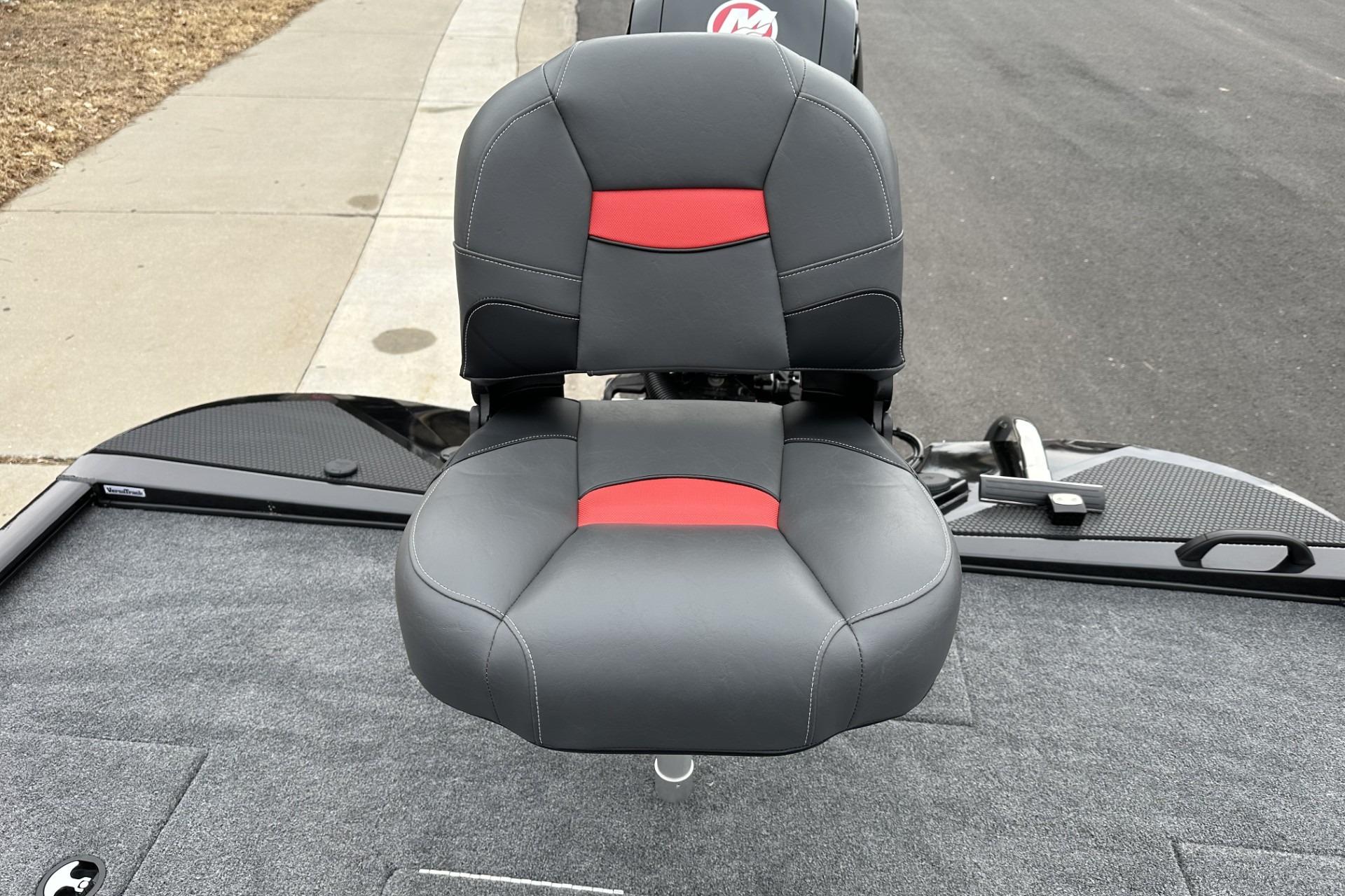 2025 Tracker Savage 215 boat seat with black and red design on a gray deck.