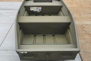 2026 Tracker Grizzly 14 Jon boat, interior view, showcasing seating and storage layout.