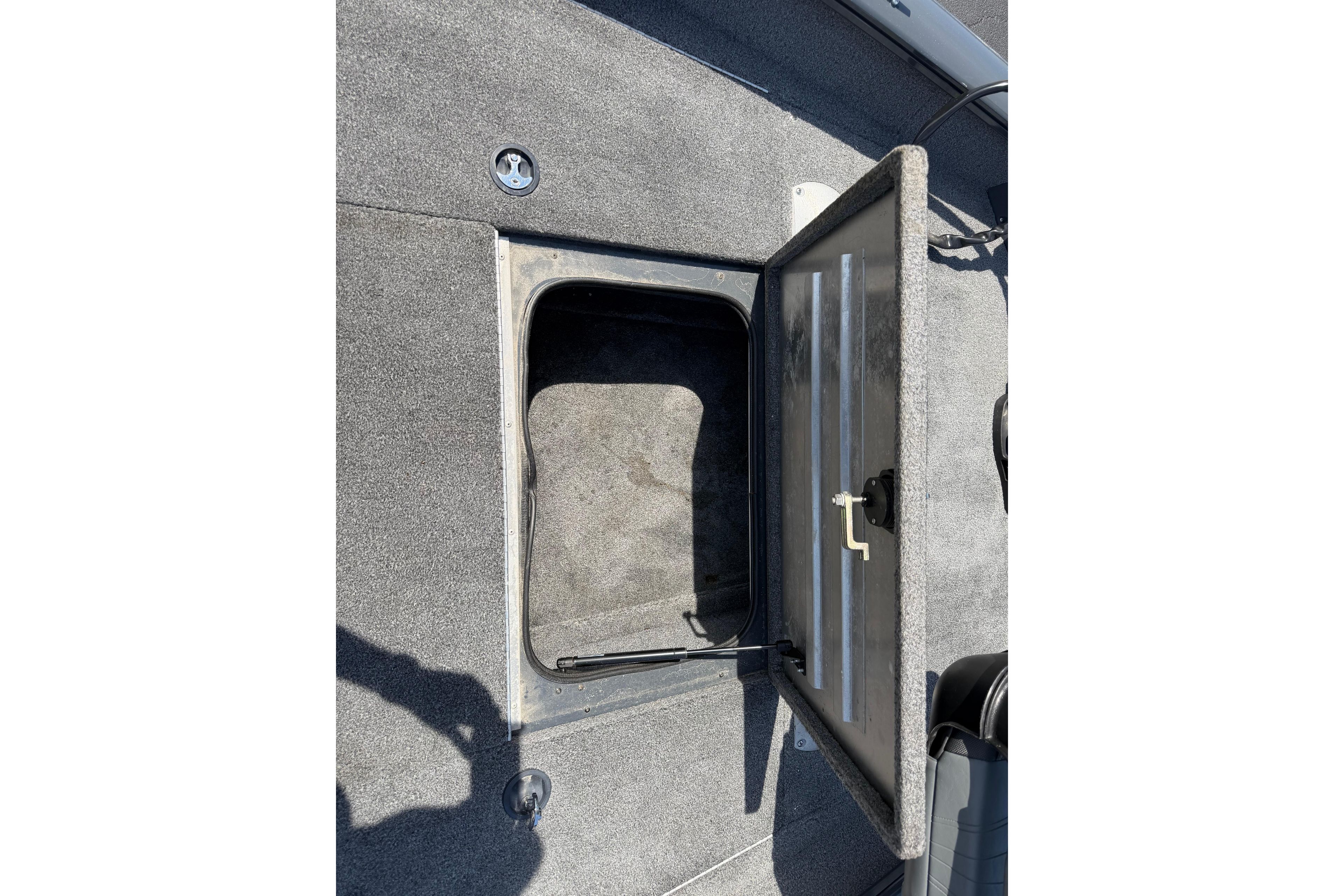 Open storage compartment on 2019 Tracker Pro Team 175 TF boat deck.