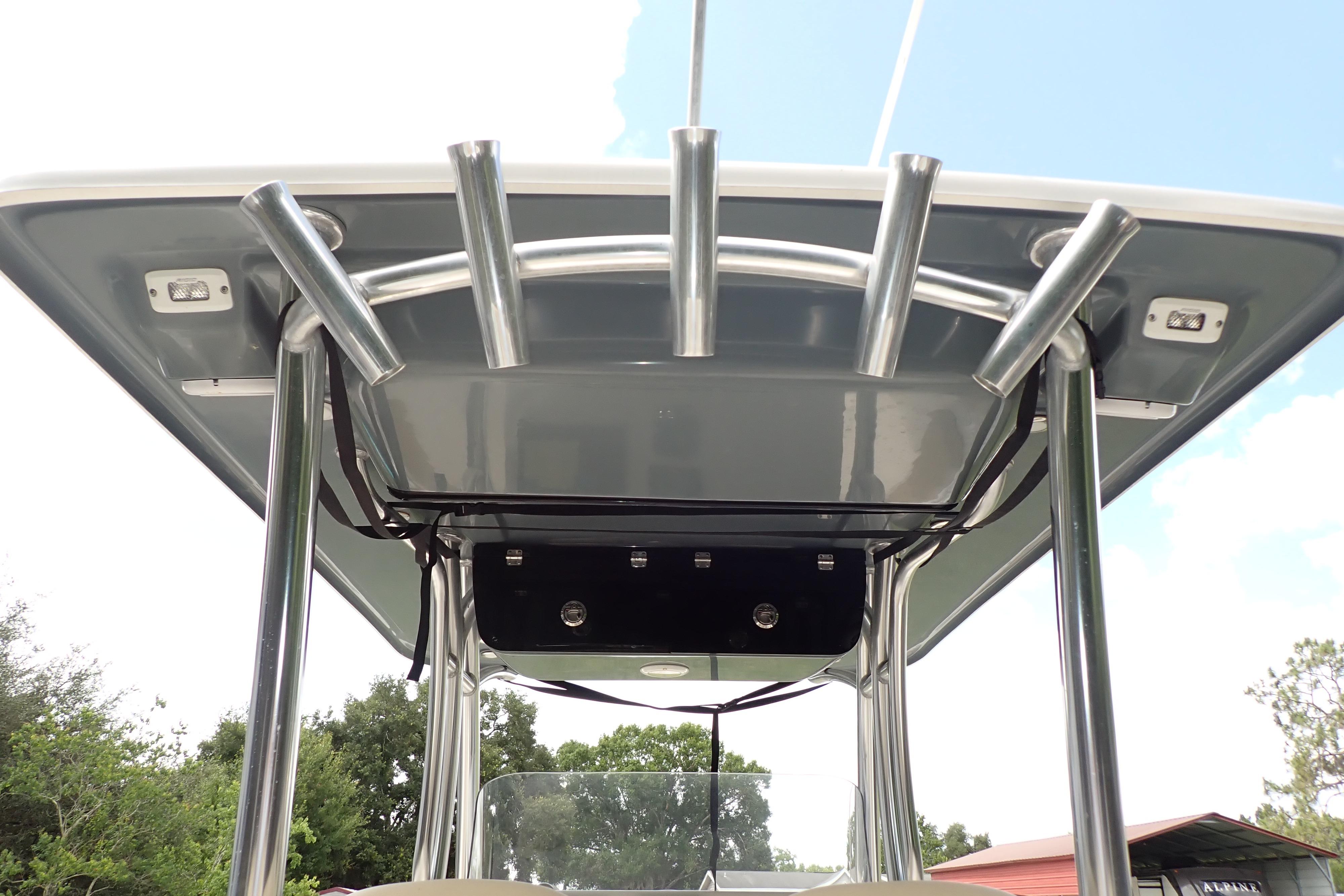2019 Key West 263 FS boat T-top with rod holders and lights.