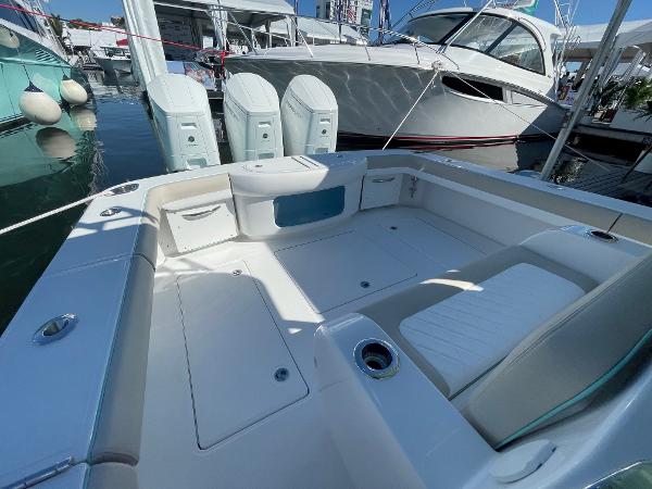 2025 Mag Bay 43 Center Console boat interior with triple outboard engines.