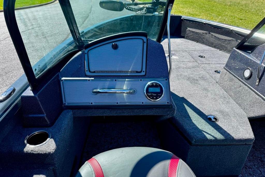 Interior view of 2026 Ranger VS1882SC Reata boat, featuring dashboard and seating area.
