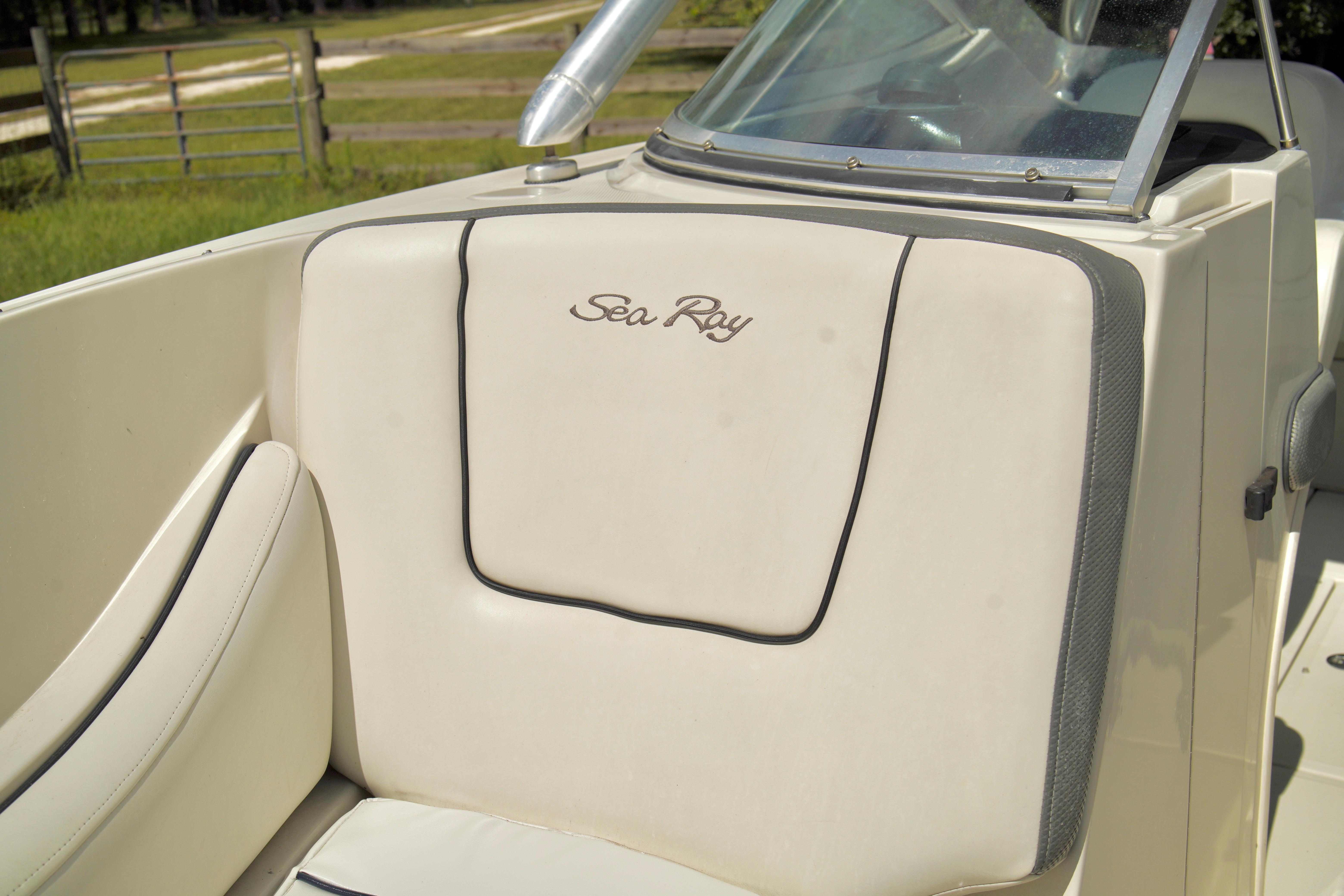 2008 Sea Ray 230 Select Fission boat interior with logo.