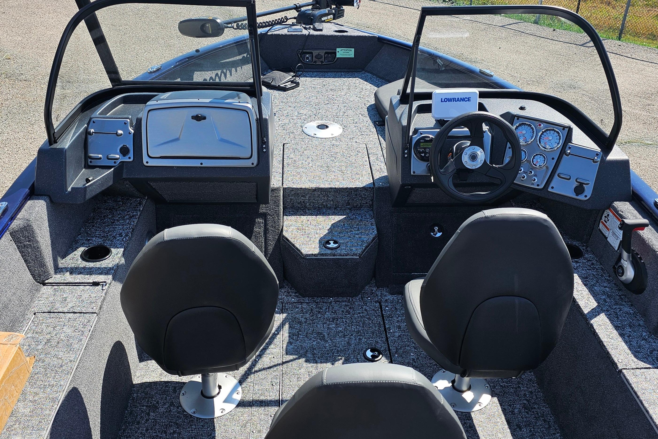 2026 Tracker Pro Guide V-175 Combo boat interior with dual seats and control panel.
