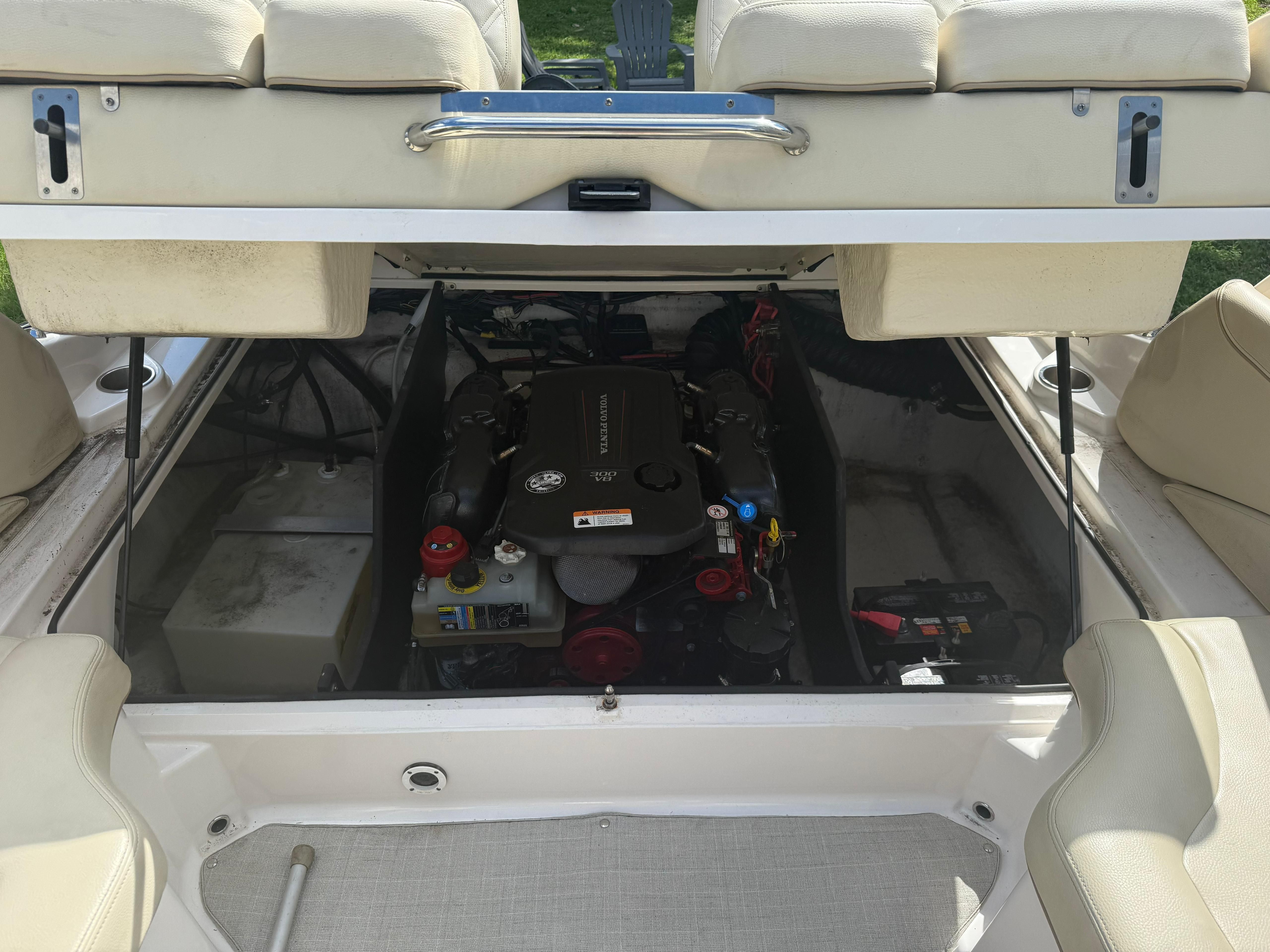 Engine compartment of a 2020 Regal 2300 Bowrider with open seating area.