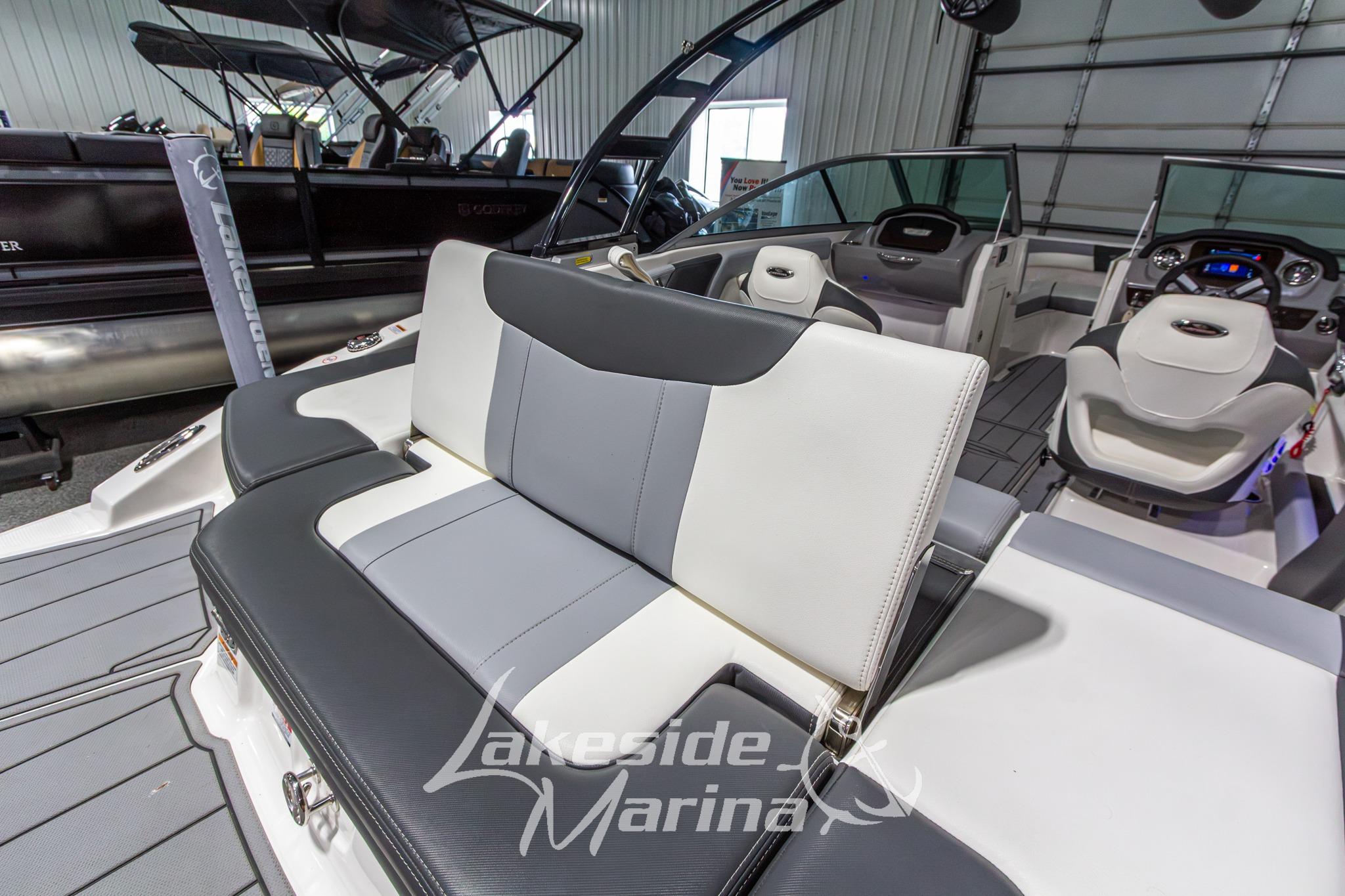 2022 Chaparral 21 SSi boat interior with sleek seating and modern dashboard at Lakeside Marina.