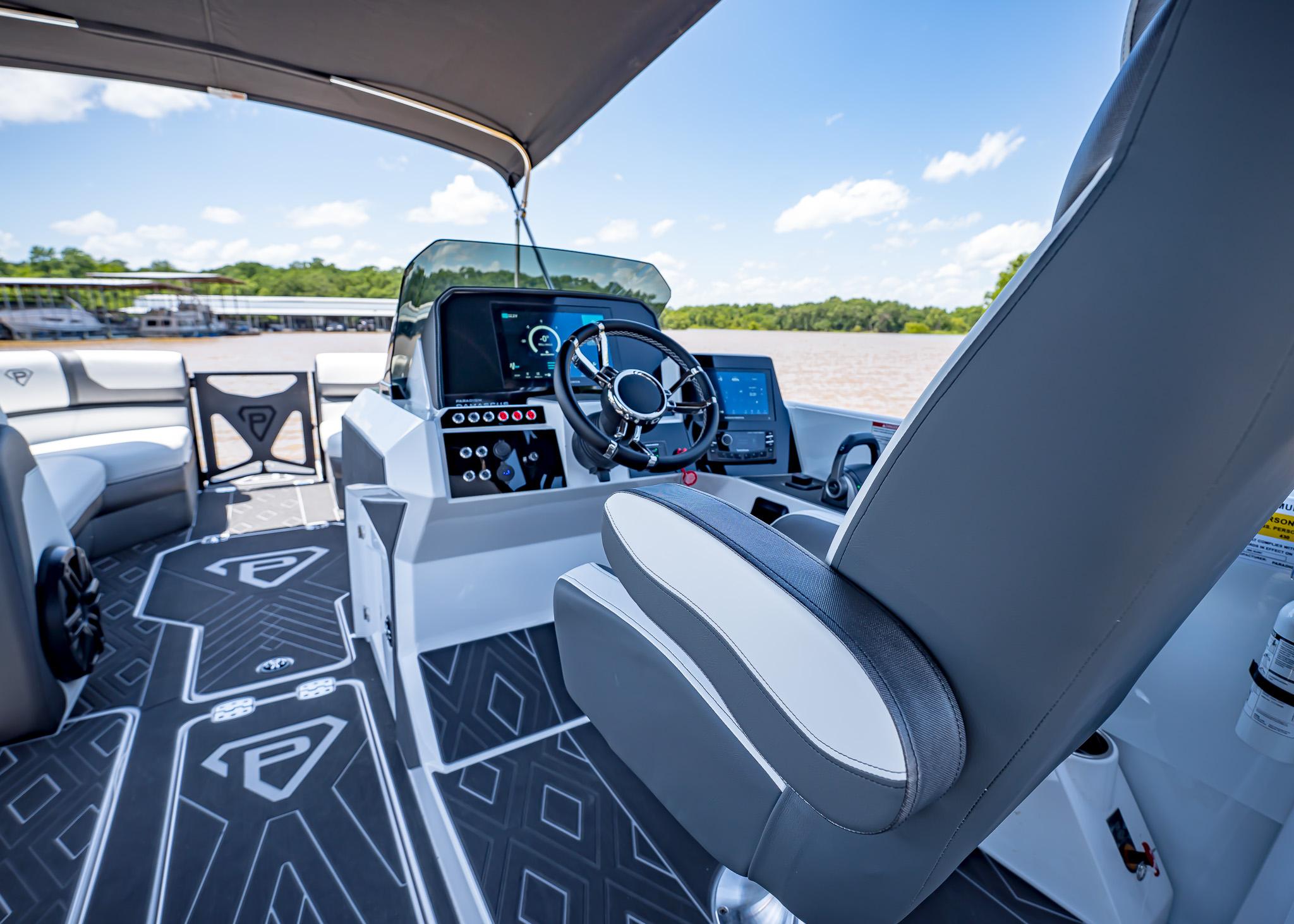 2025 Paradigm Damascus 266 Surf boat interior with modern helm and seating.