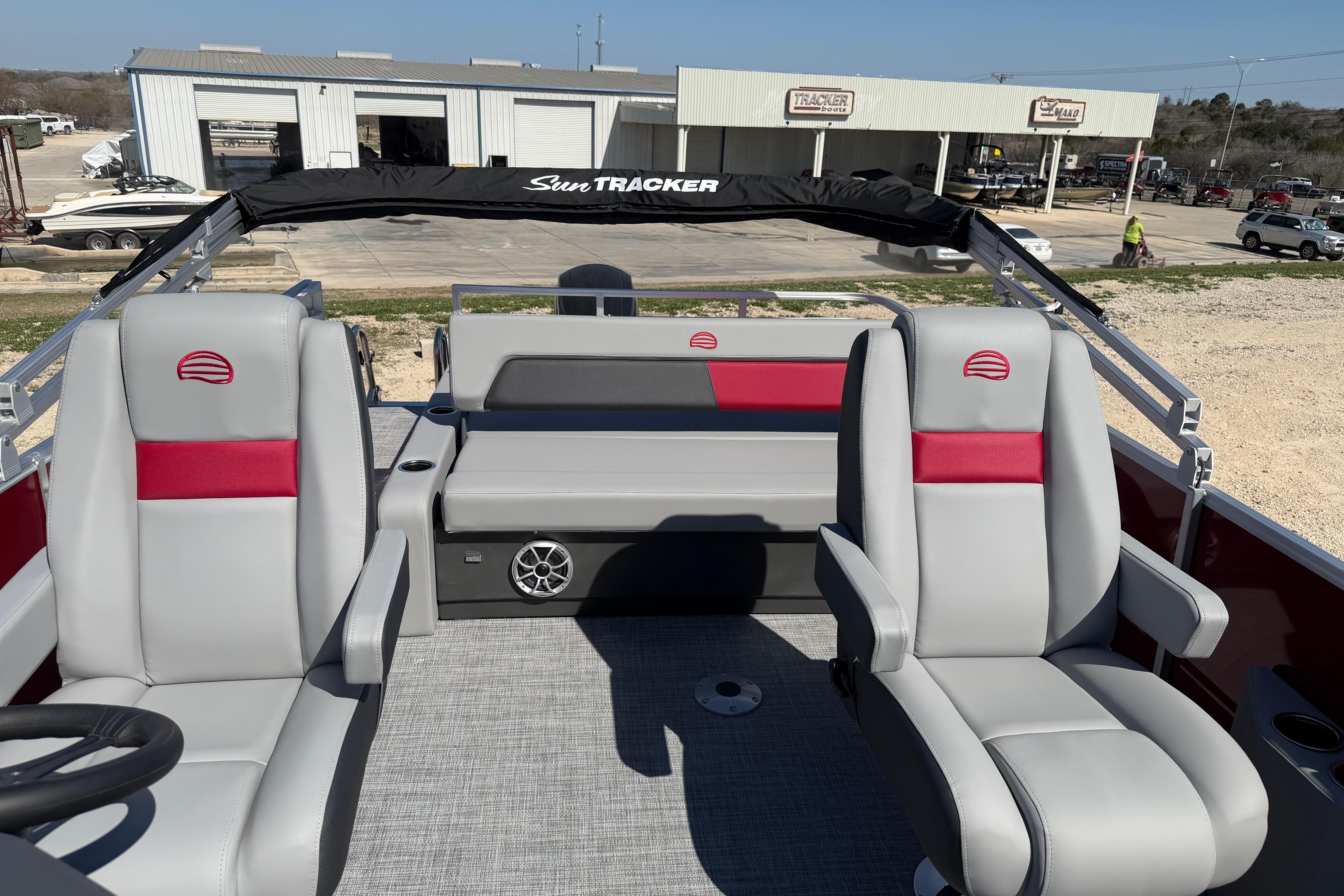 2026 Sun Tracker Party Barge 22 RF XP3 interior with gray and red seating.
